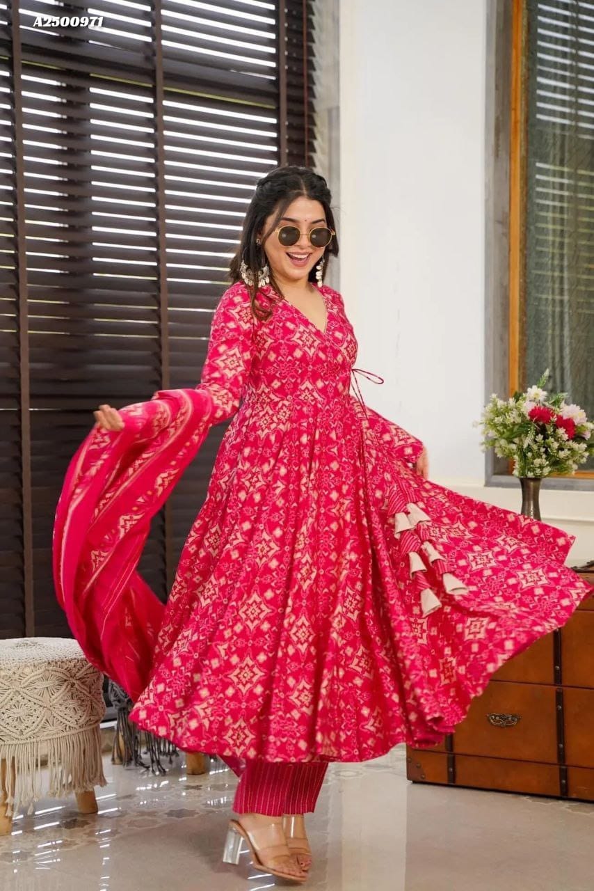 Close-up of the intricate handcrafted latkan tassel details on the pink kurti