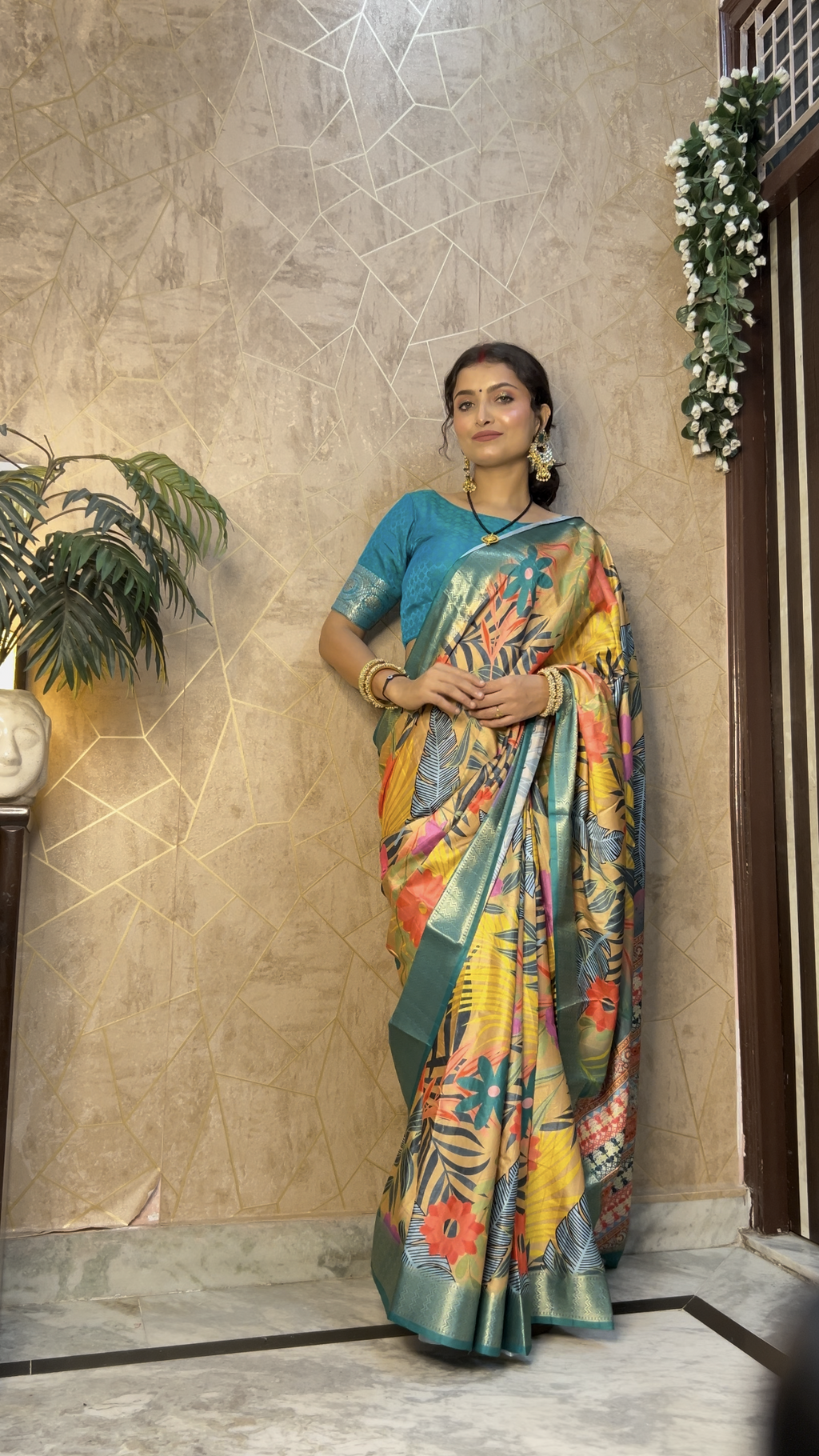 Vibrant teal blue printed silk saree