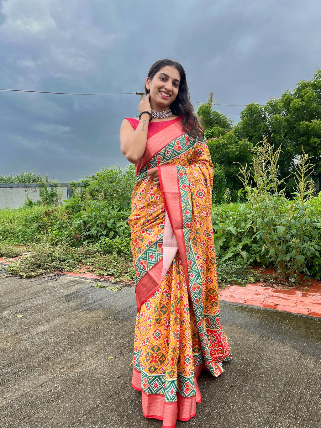 Pure Dola Silk Digital Print Saree showing vibrant patterns and tassel edges