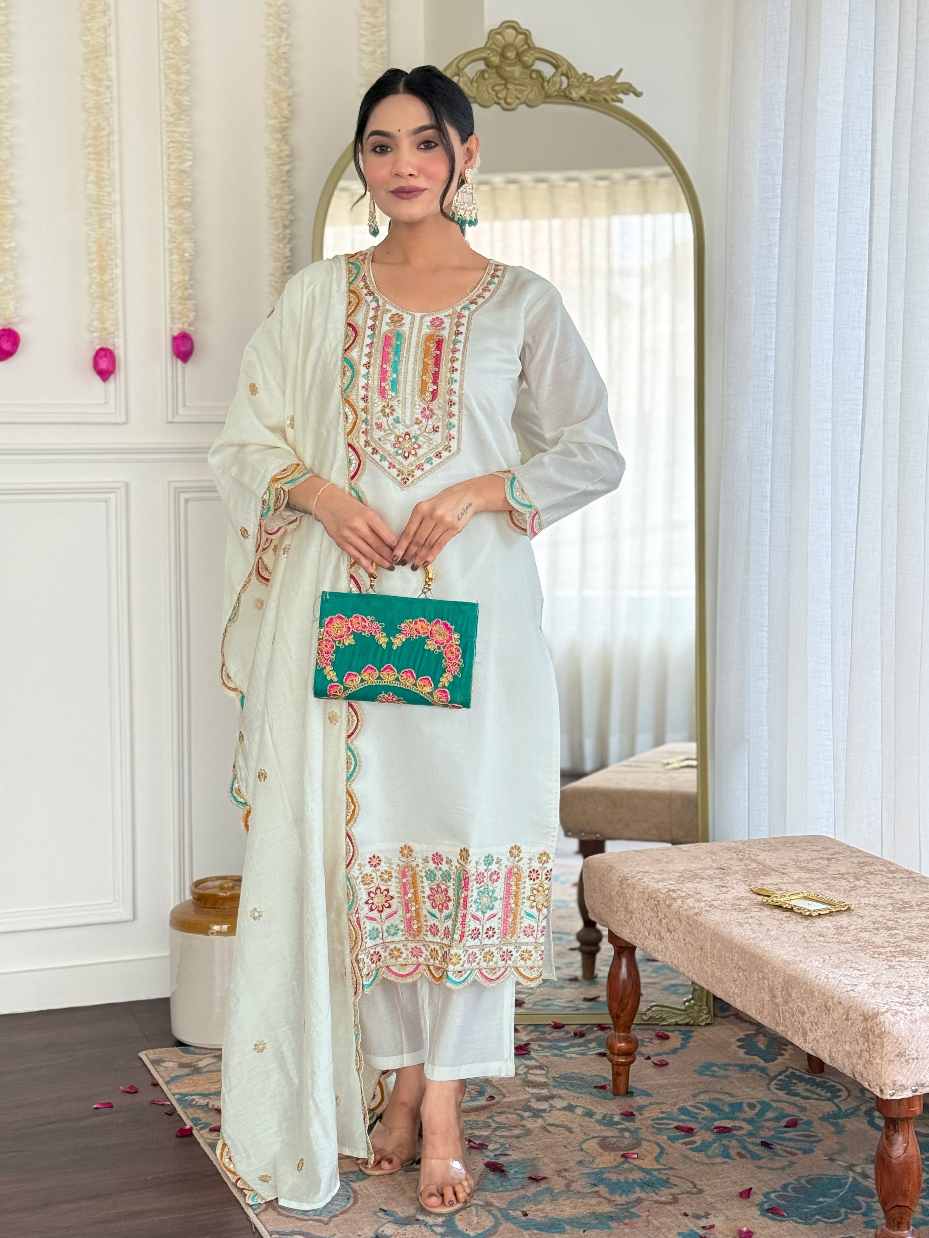 Front view of model in TRENDBUY's VI-ANAMIKA kurta set, featuring colorful embroidery on the kurti and dupatta, suitable for festive occasions.