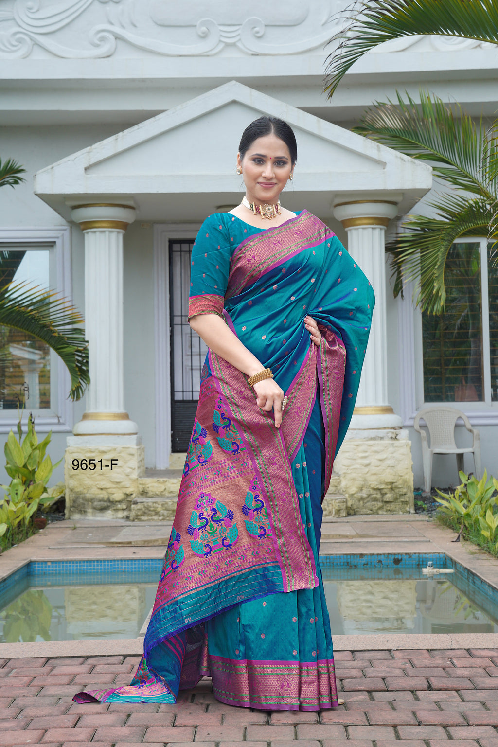 Beautifully designed Paithani saree, a vibrant piece of Indian traditional wear