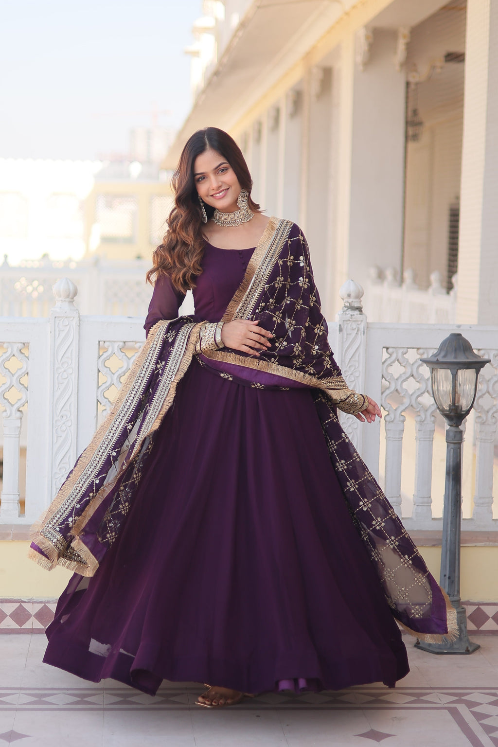 Elegant wine round neck gown and matching dupatta on a model