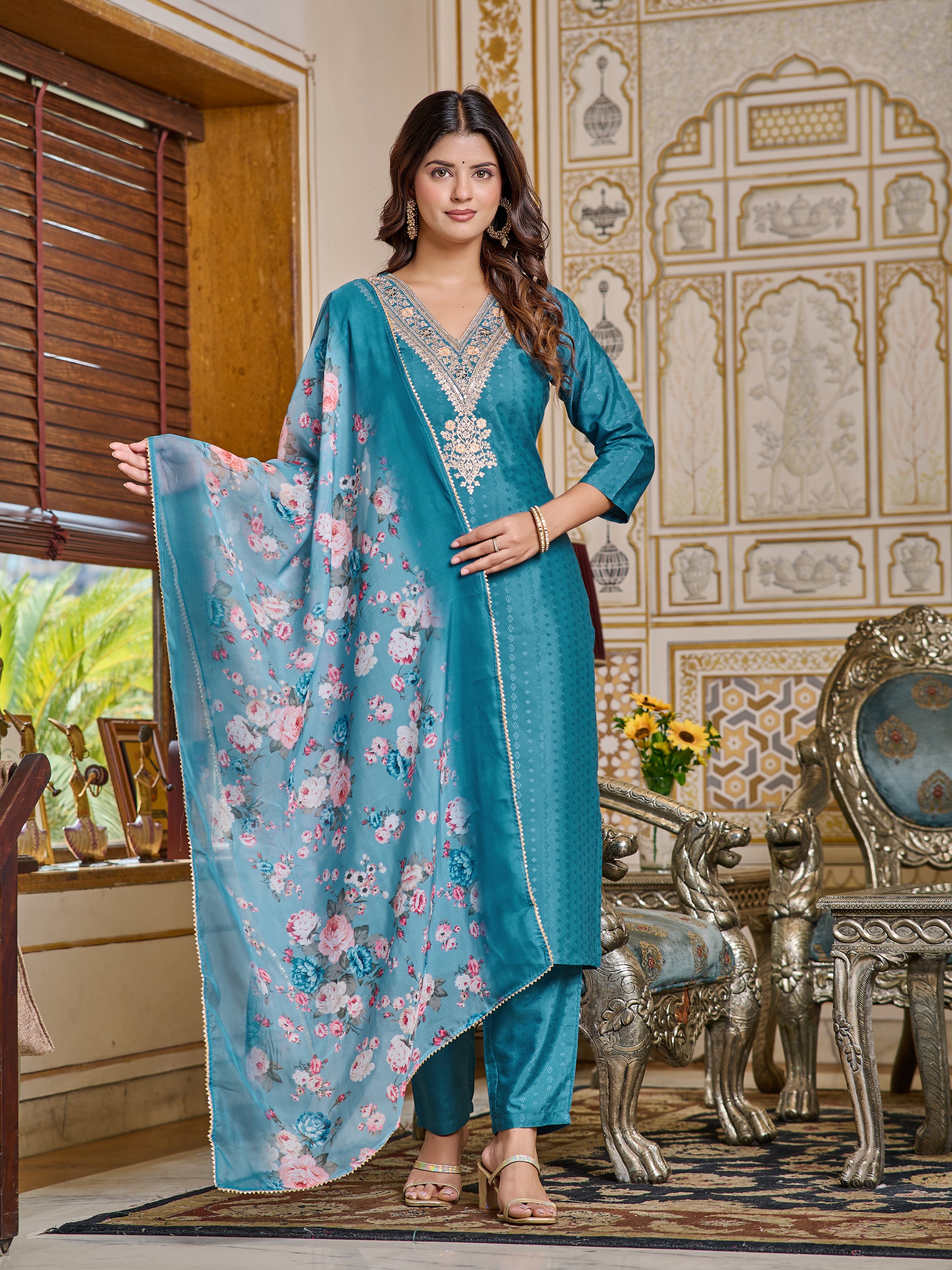Model posing elegantly, highlighting the complete look of the teal kurta set and digital print dupatta.