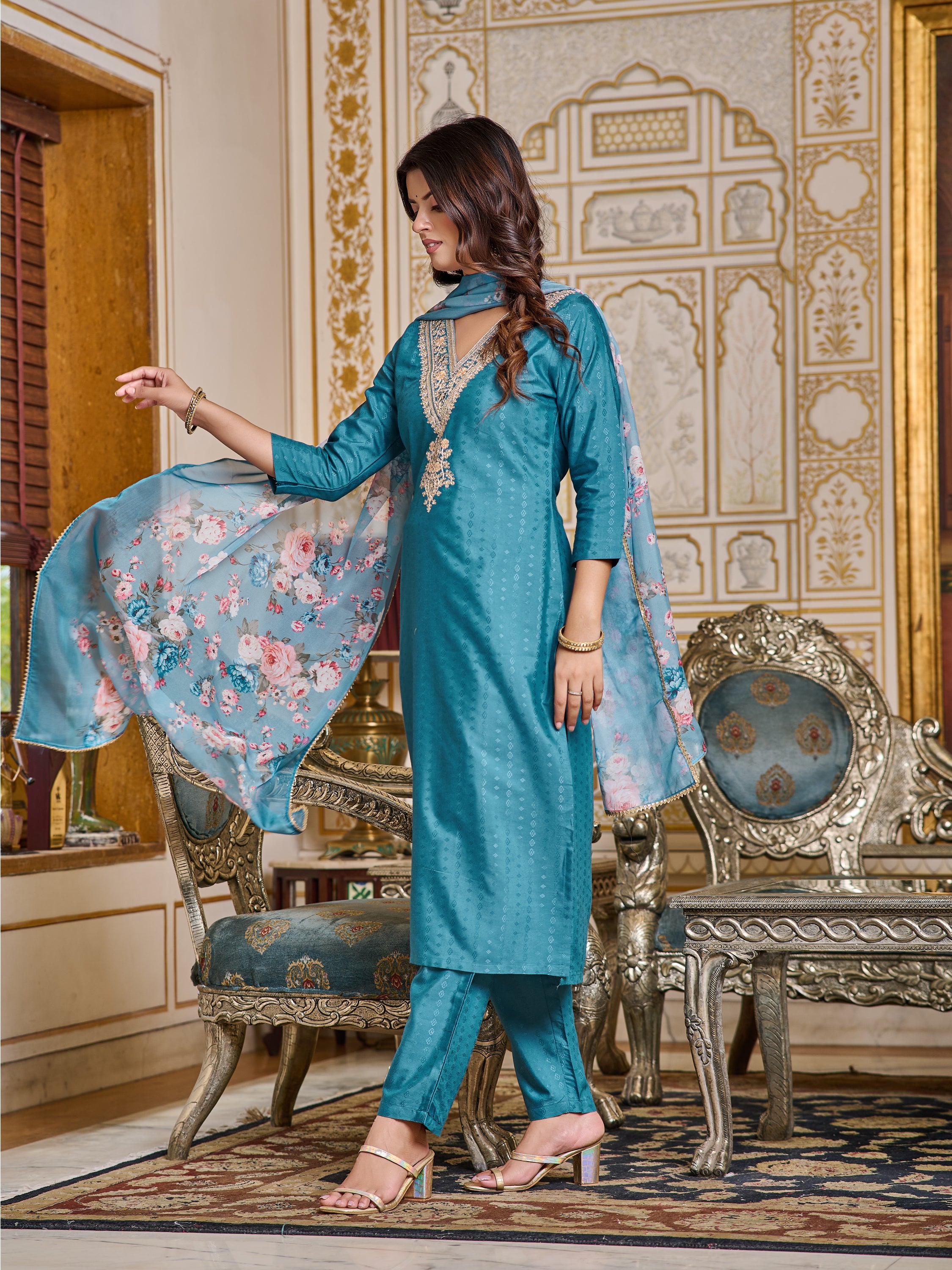 Dynamic shot of the model gracefully moving, showing the flow and comfort of the TRENDBUY teal kurta set.