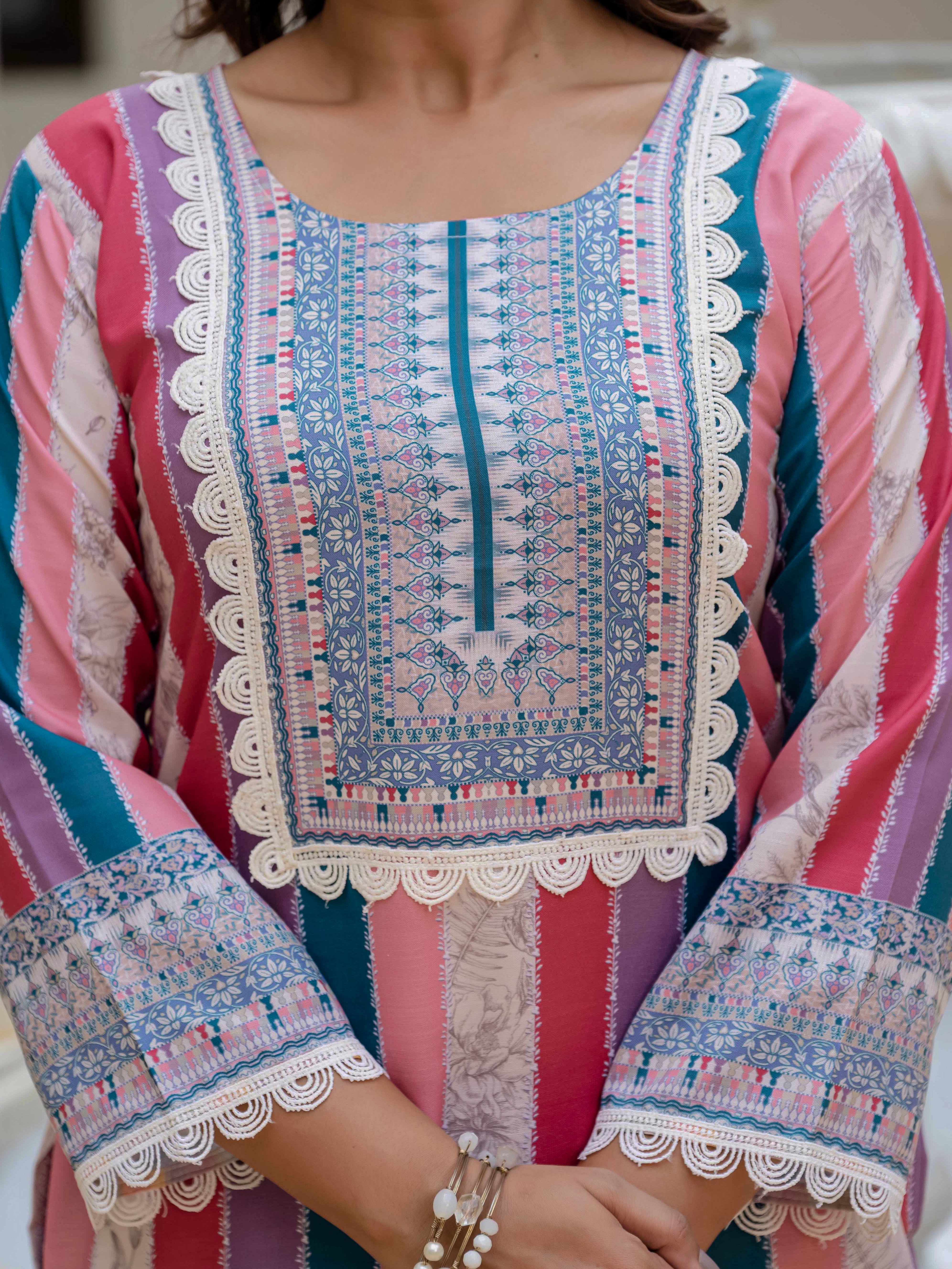 Close-up of Laila Pink Kurta Set neckline, showing detailed embroidery and multi-colored vertical stripes.