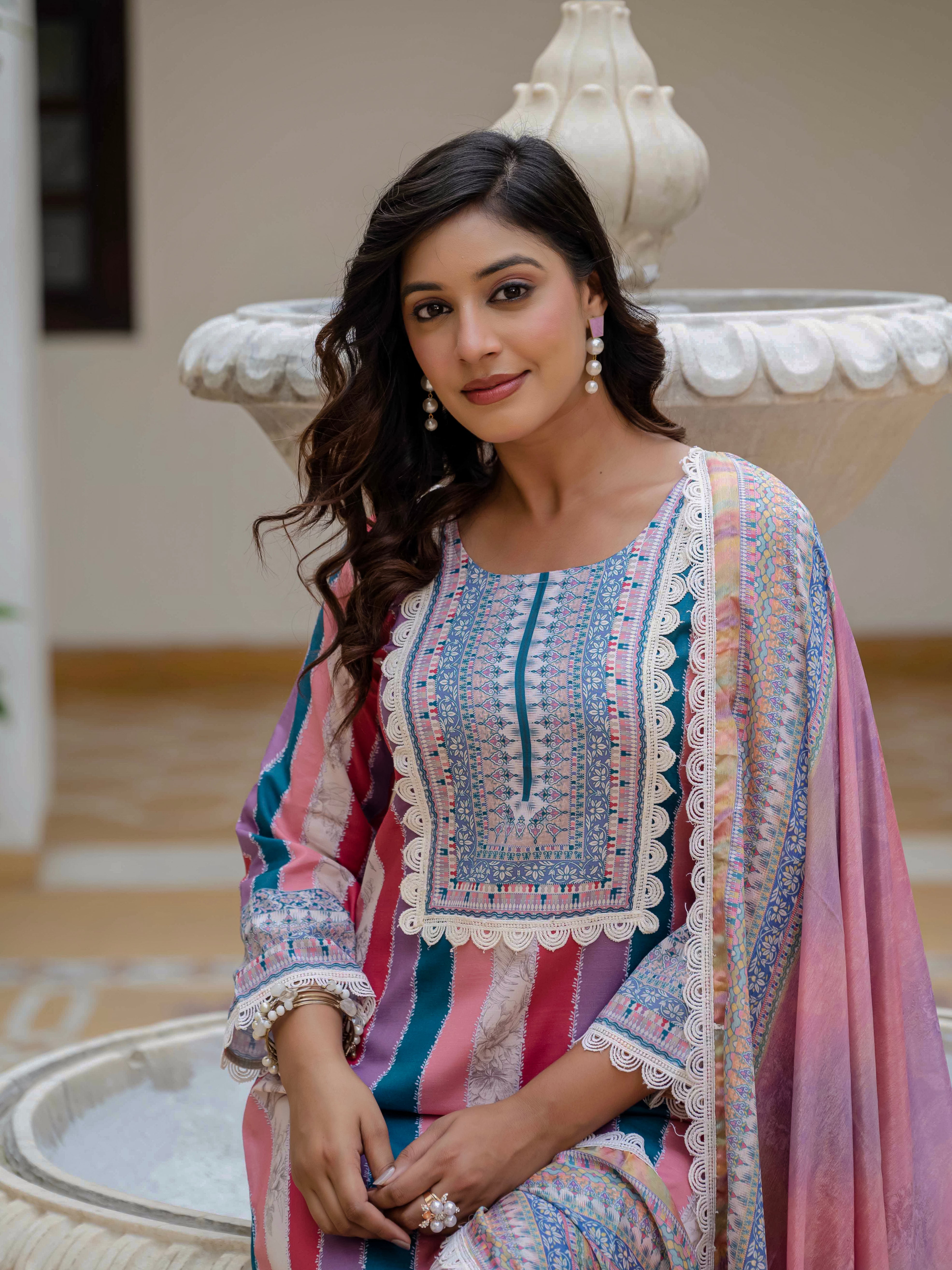 Closer portrait of model in Laila Pink Kurta Set, emphasizing the neckline embroidery and pearl earrings.