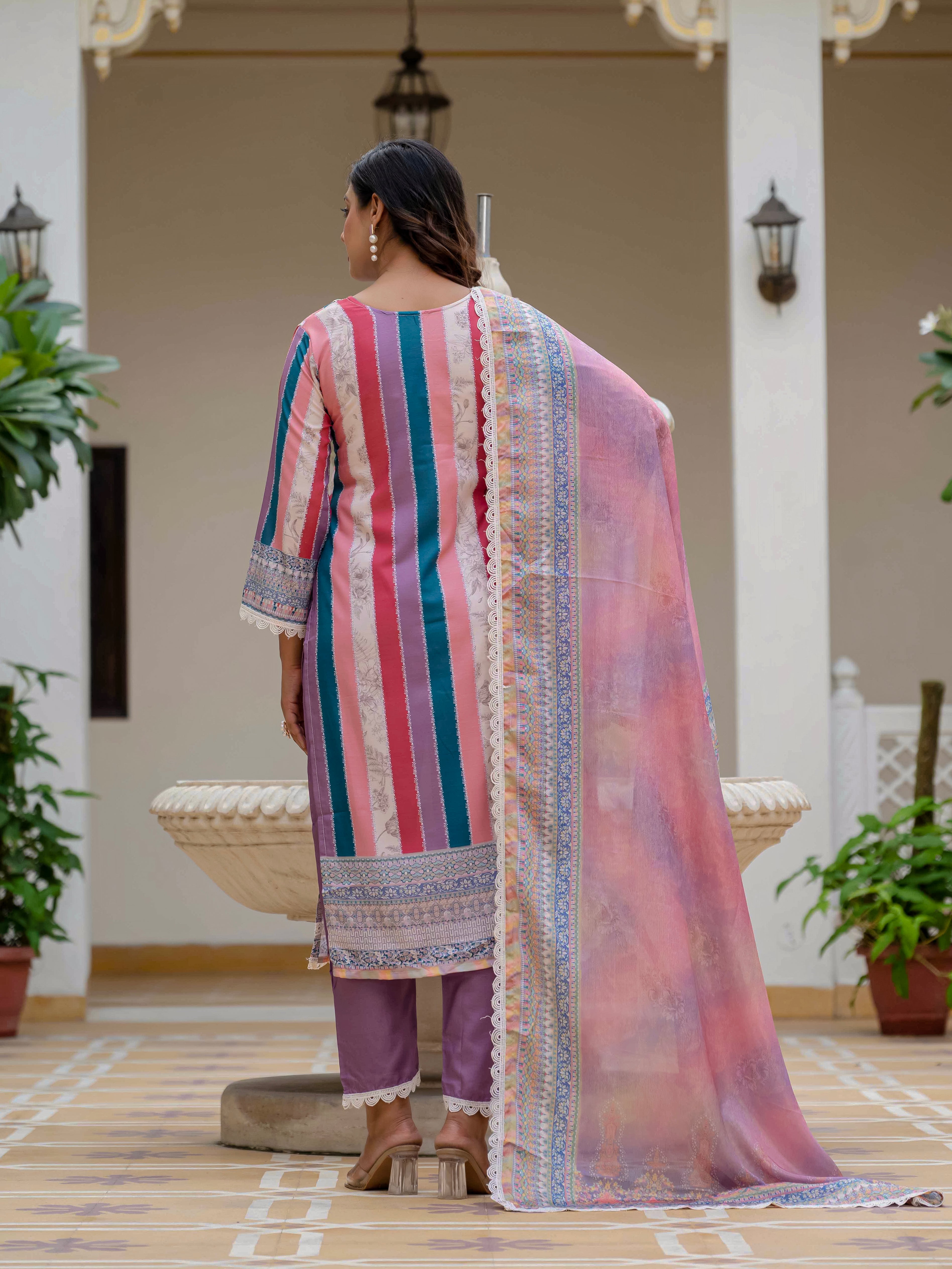 Back view of model wearing Laila Pink Kurta Set, displaying the full print on the chinon dupatta and coordinating purple pants.