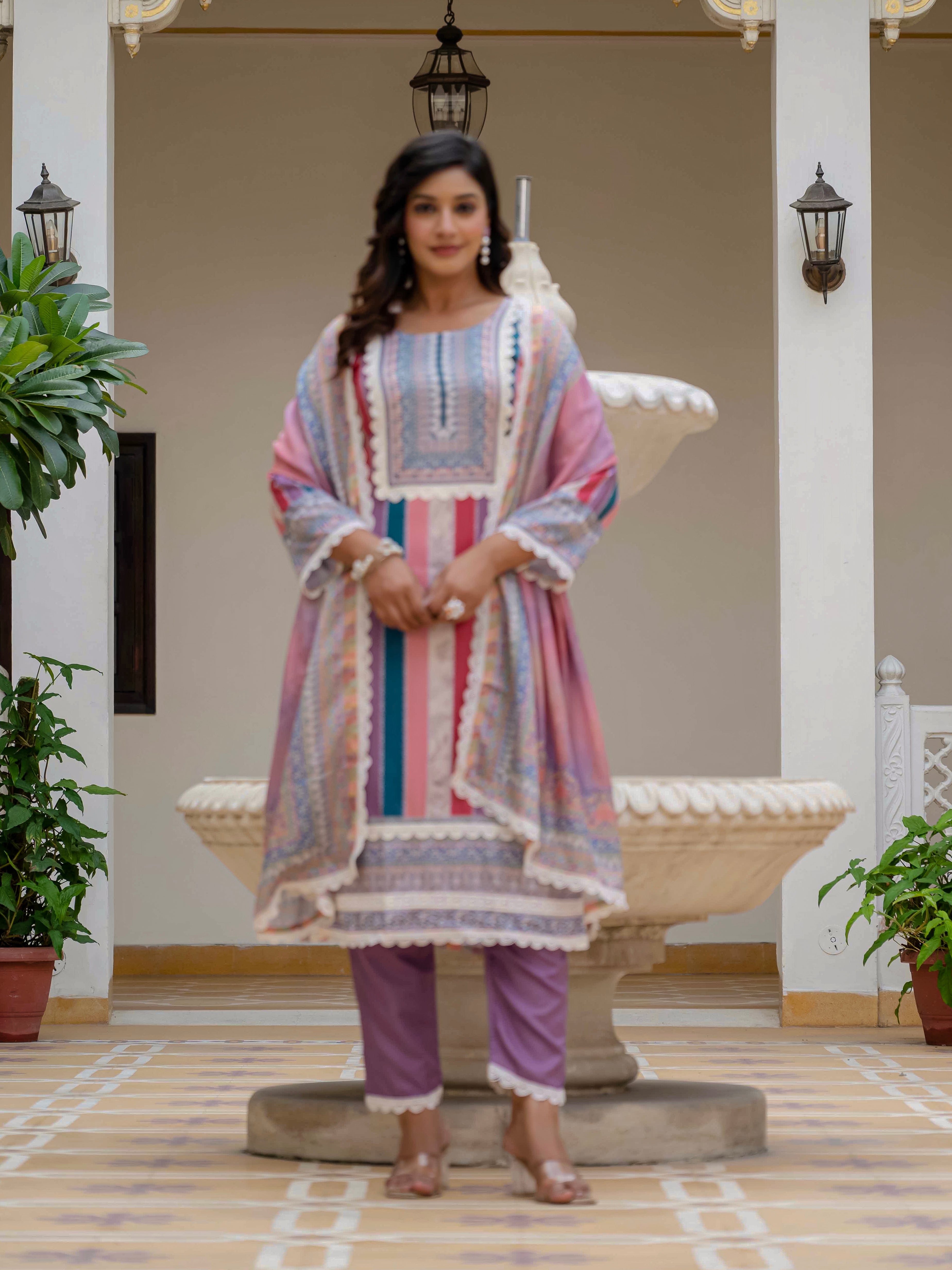 Model in Laila Pink Kurta Set, posing with the dupatta elegantly draped, showing the full ensemble.