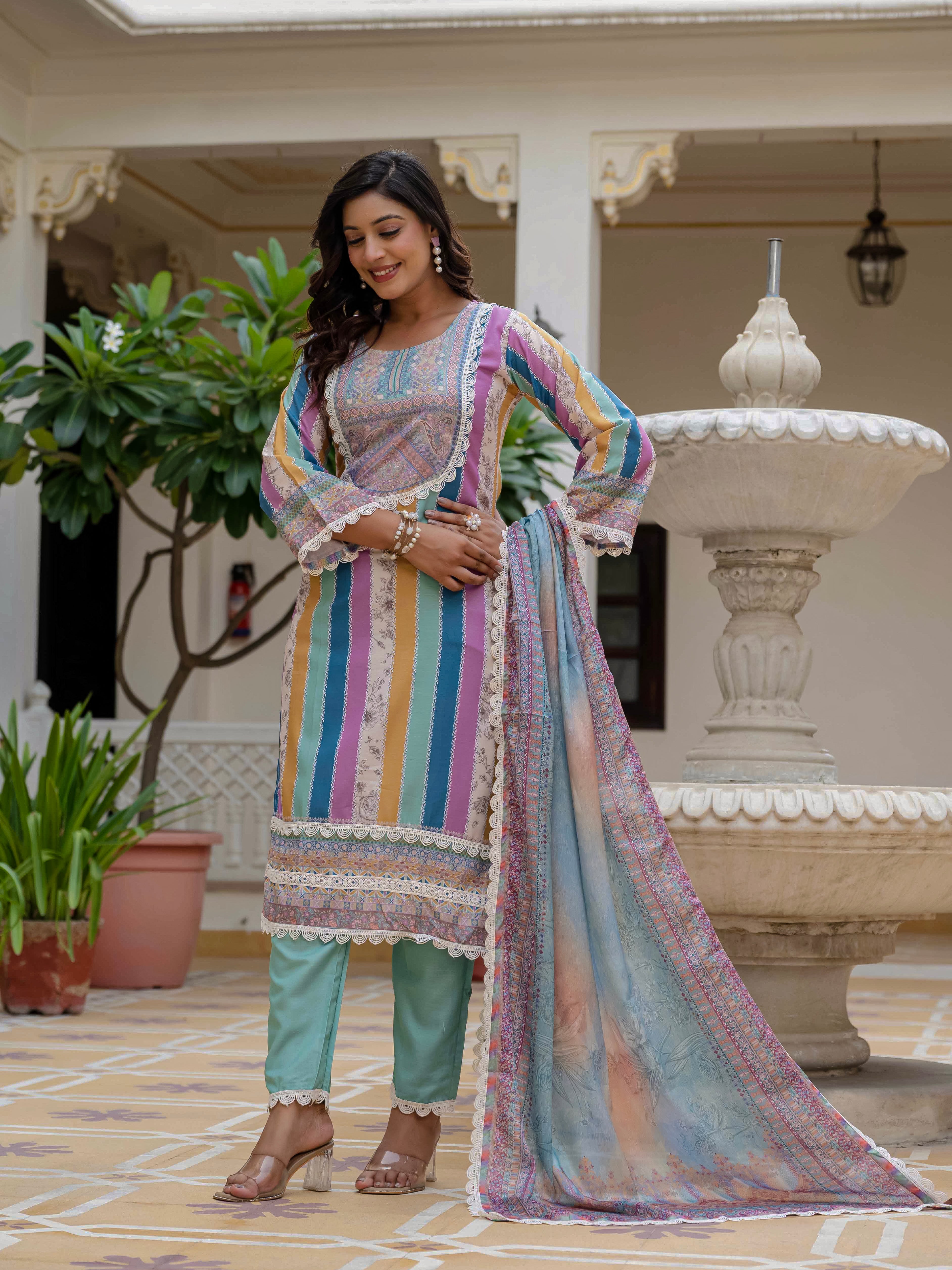 Model in Laila Sky Kurta Set looking downwards, highlighting the comfortable drape and stylish design.
