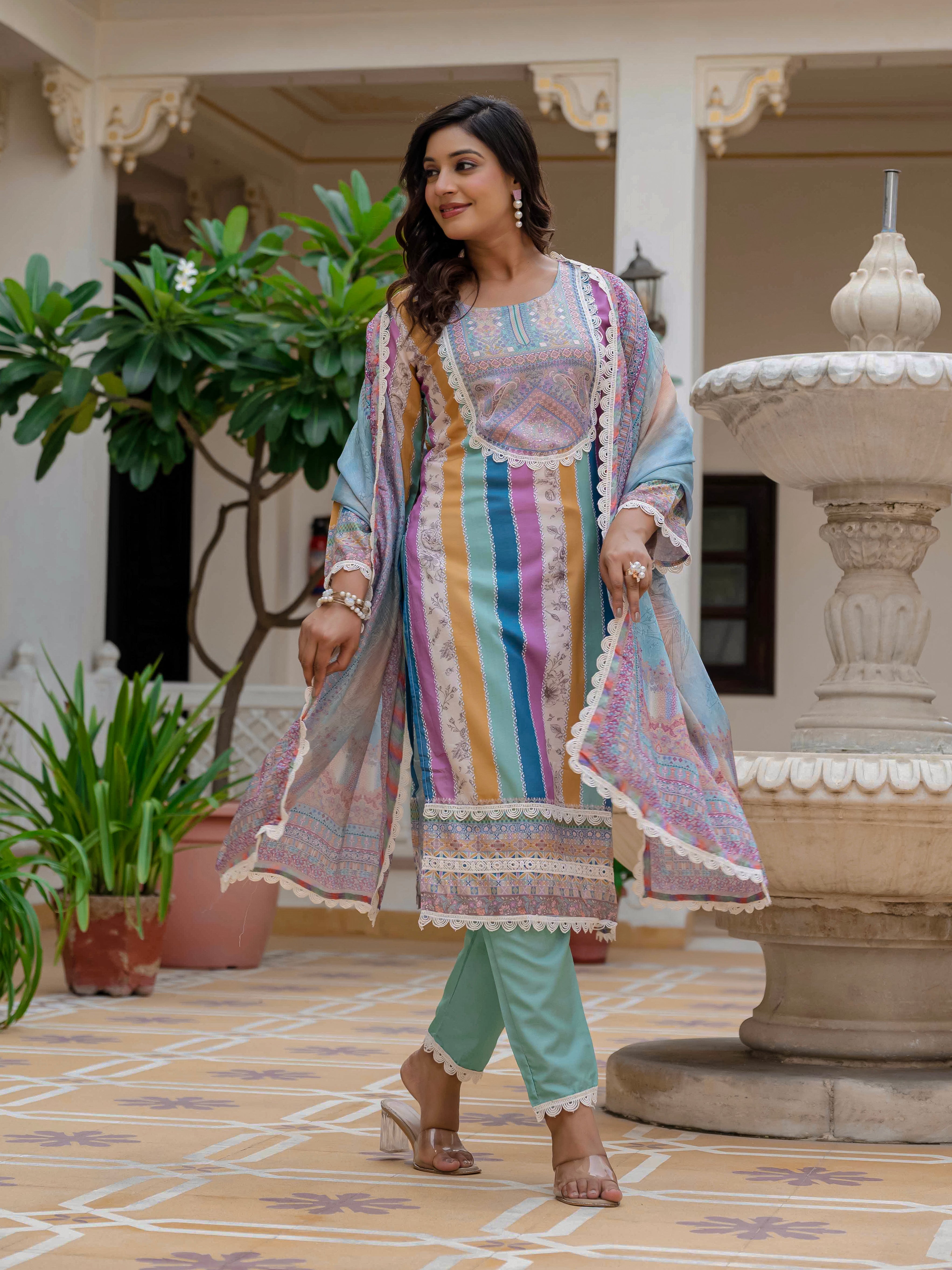 Model in Laila Sky Kurta Set looking away, showcasing the full flow of the dupatta and the complete outfit.