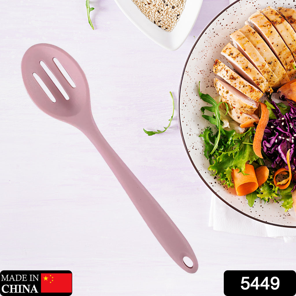 Heat-resistant silicone kitchen utensil set with organizer holder for cooking.