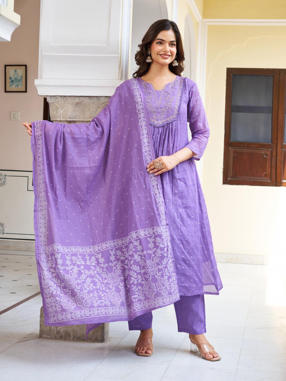 Model in a lavender kurti set with dupatta draped over her shoulder, standing confidently and showcasing the full ethnic outfit.