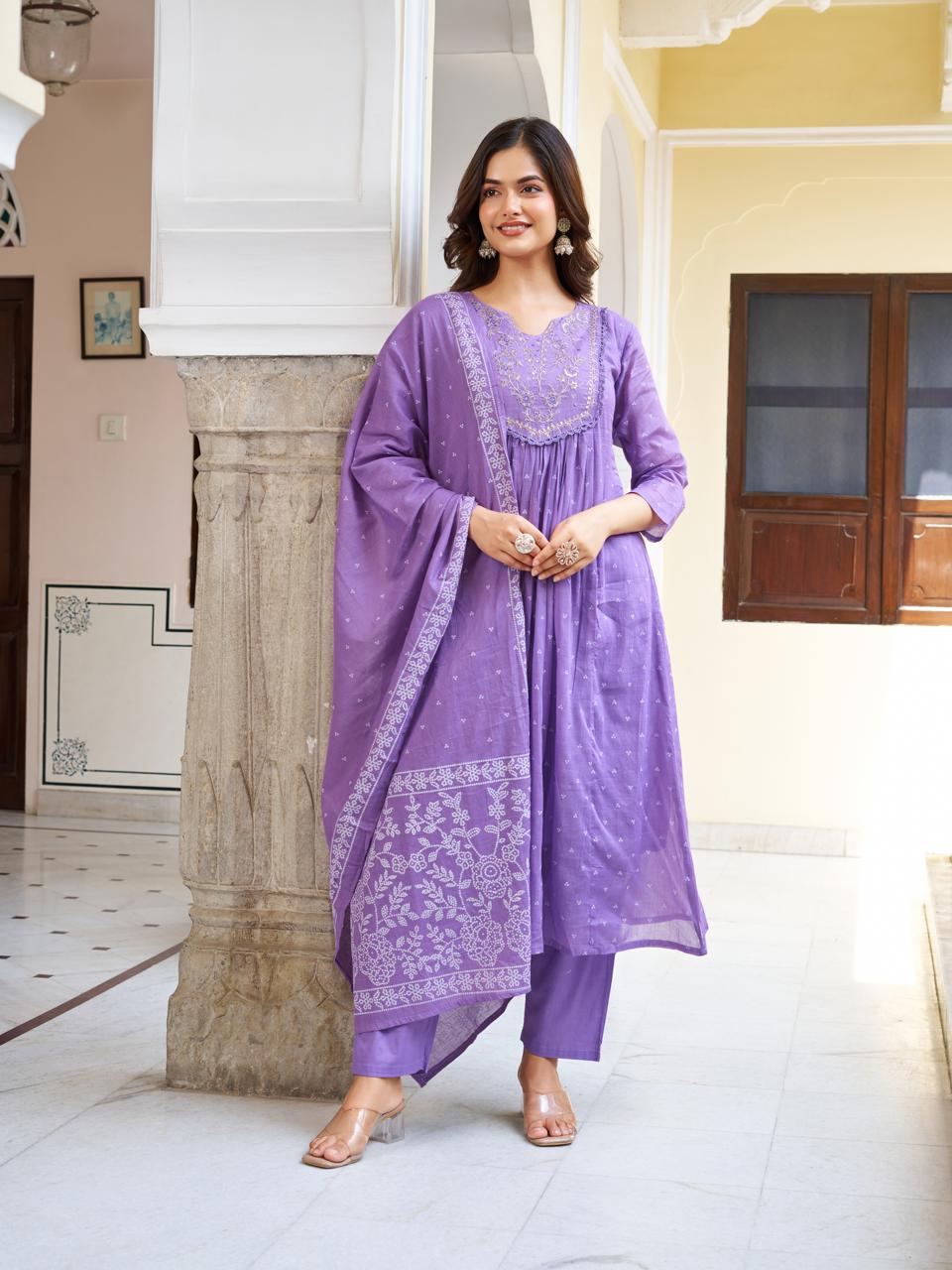 Full shot of a model in a lavender kurti set, looking confident and poised, with the printed dupatta draped naturally.