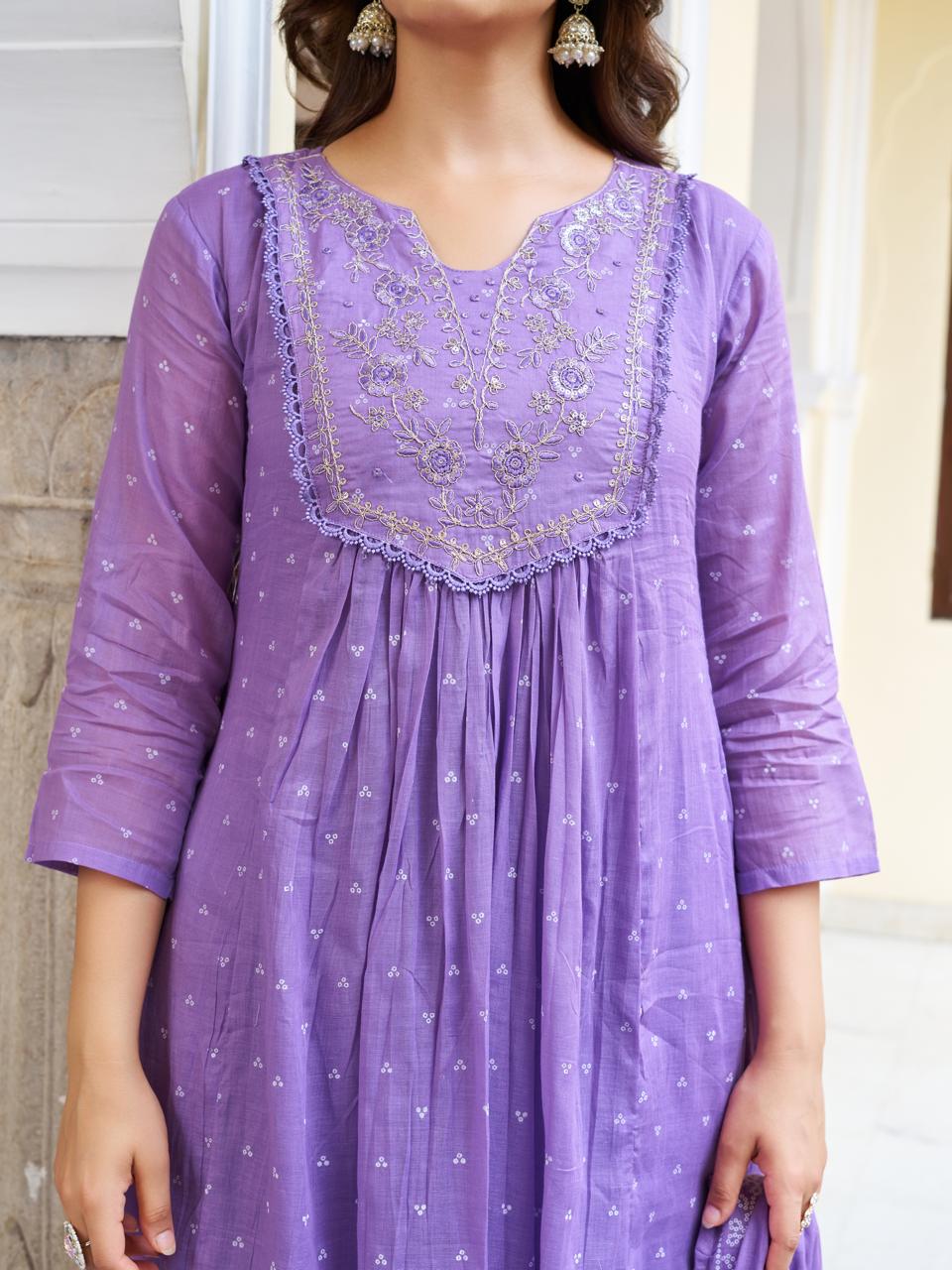 Detailed close-up of the lavender kurti's embroidered V-neckline and gathered bust design, showcasing the fabric's soft texture and print.