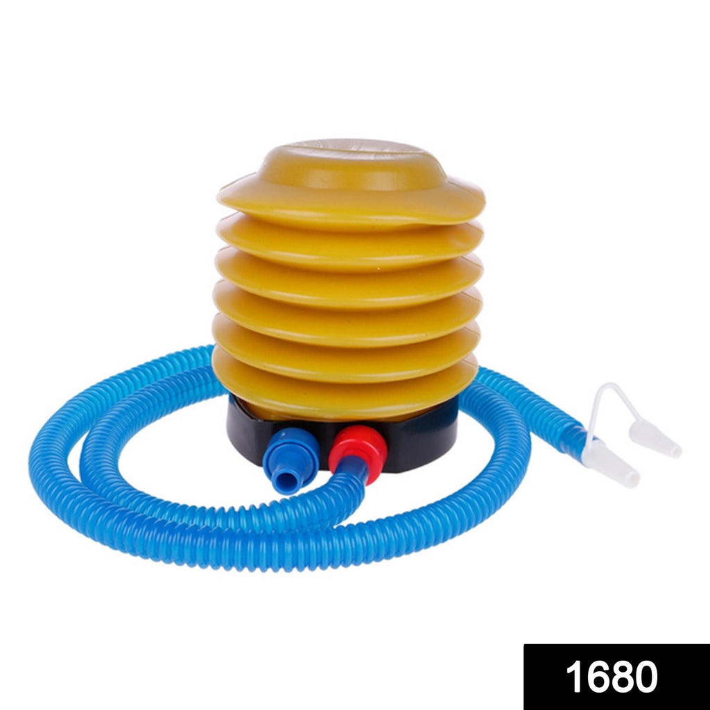 Yellow 1680 portable foot air pump with hose in use, being operated by a foot
