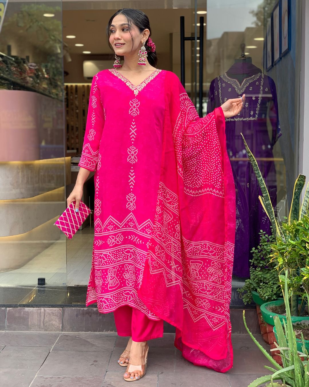 TRENDBUY woman showcasing the versatile drape of the Rani Pink chinon dupatta with the French Crepe kurta set