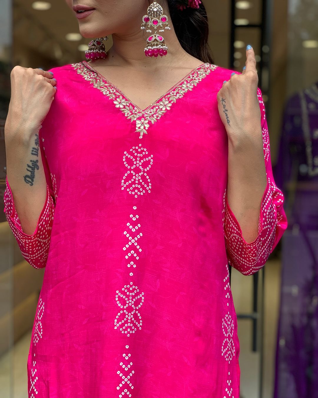 Close-up of intricate V-neck embroidery and delicate prints on Rani Pink French Crepe kurti by TRENDBUY