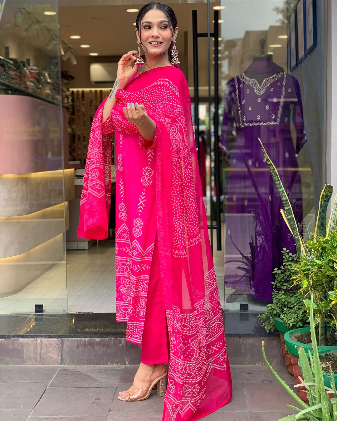Full-length side profile of TRENDBUY woman in Rani Pink French Crepe kurta set, showcasing the complete outfit