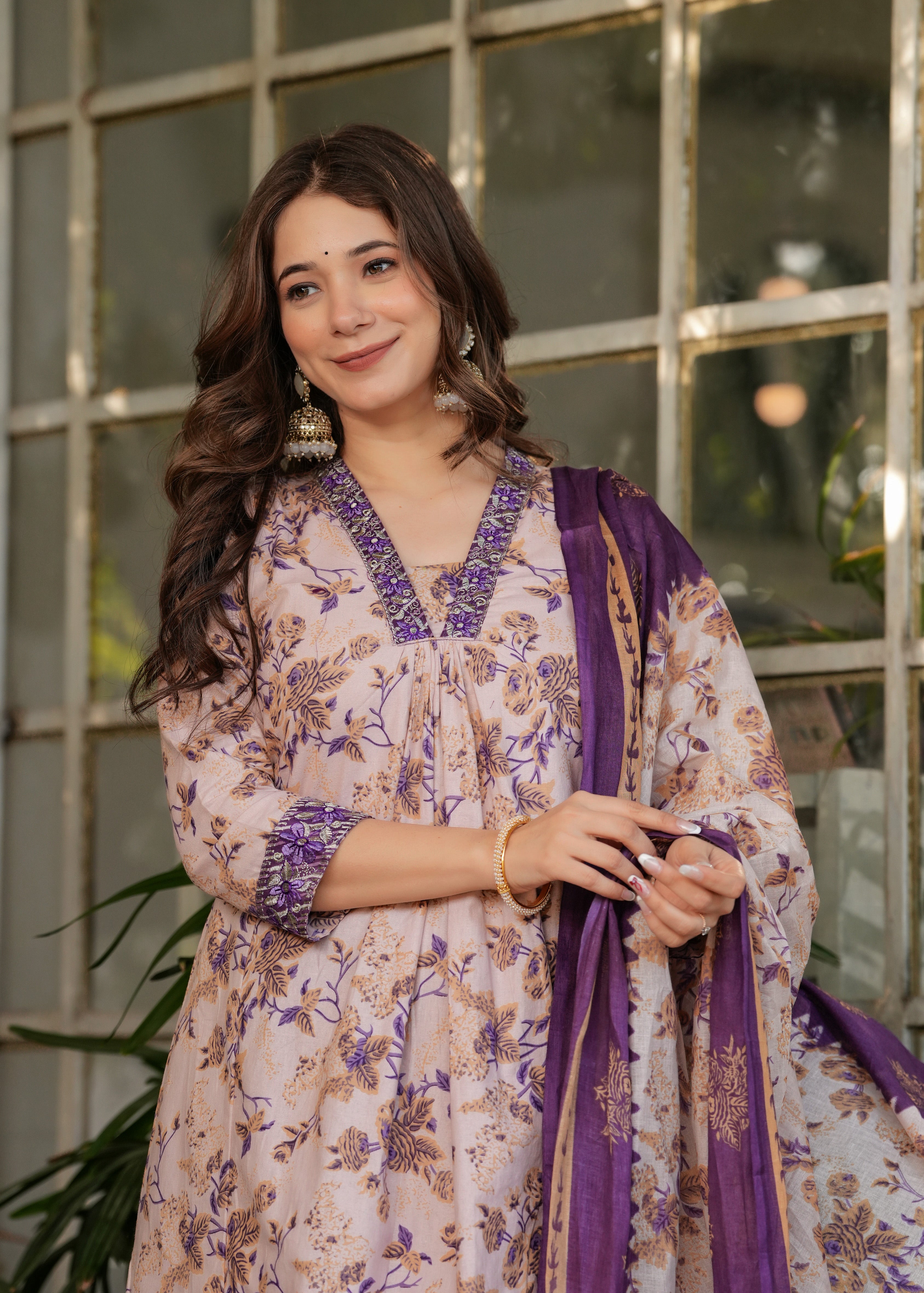 TRENDBUY Women's Kurta Set close-up, showing intricate neck and sleeve detailing with vibrant purple embroidery/print.