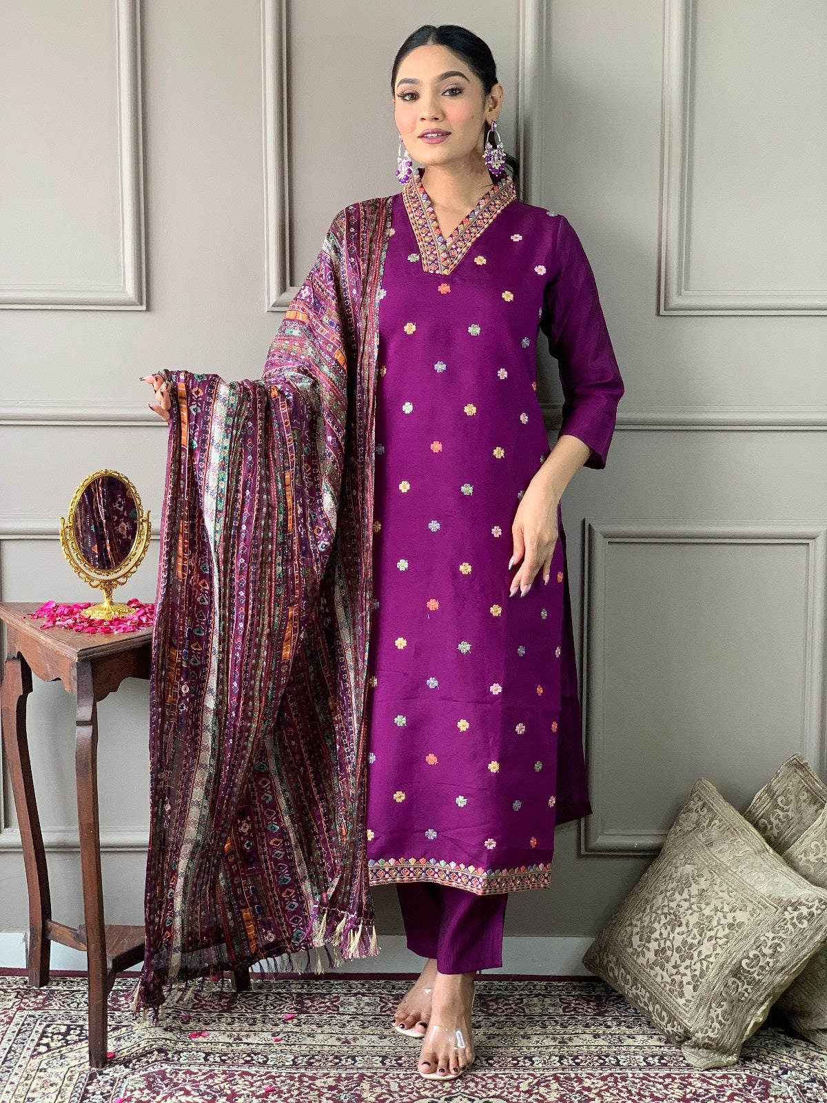 Woman gracefully holding the end of the printed dupatta, displaying its detailed tassels and ethnic pattern from TRENDBUY.