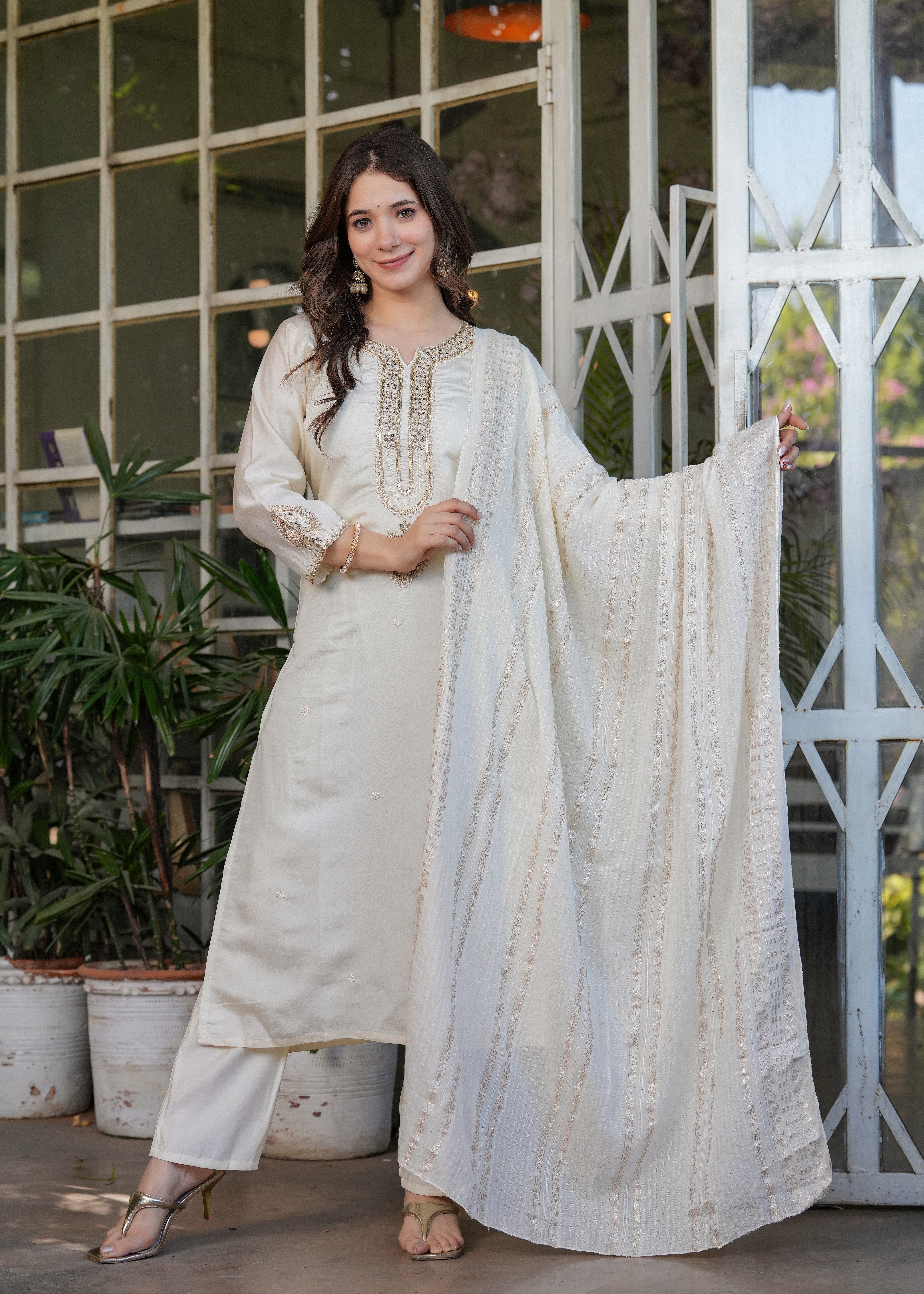 TRENDBUY woman showcasing off-white embroidered dupatta with striped jacquard pattern