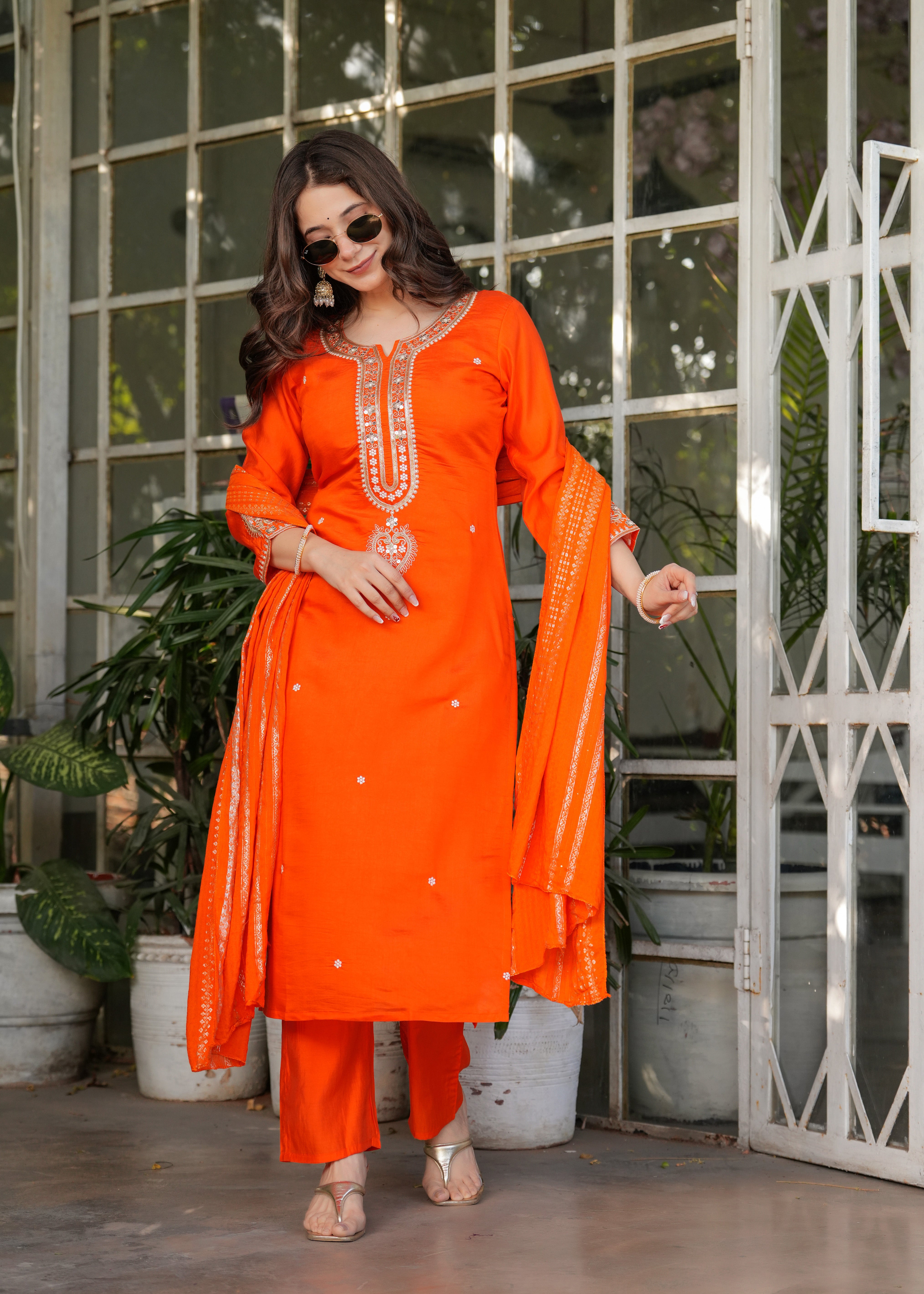 TRENDBUY woman in orange Viscose Chanderi embroidered kurta set, elegant pose, full length