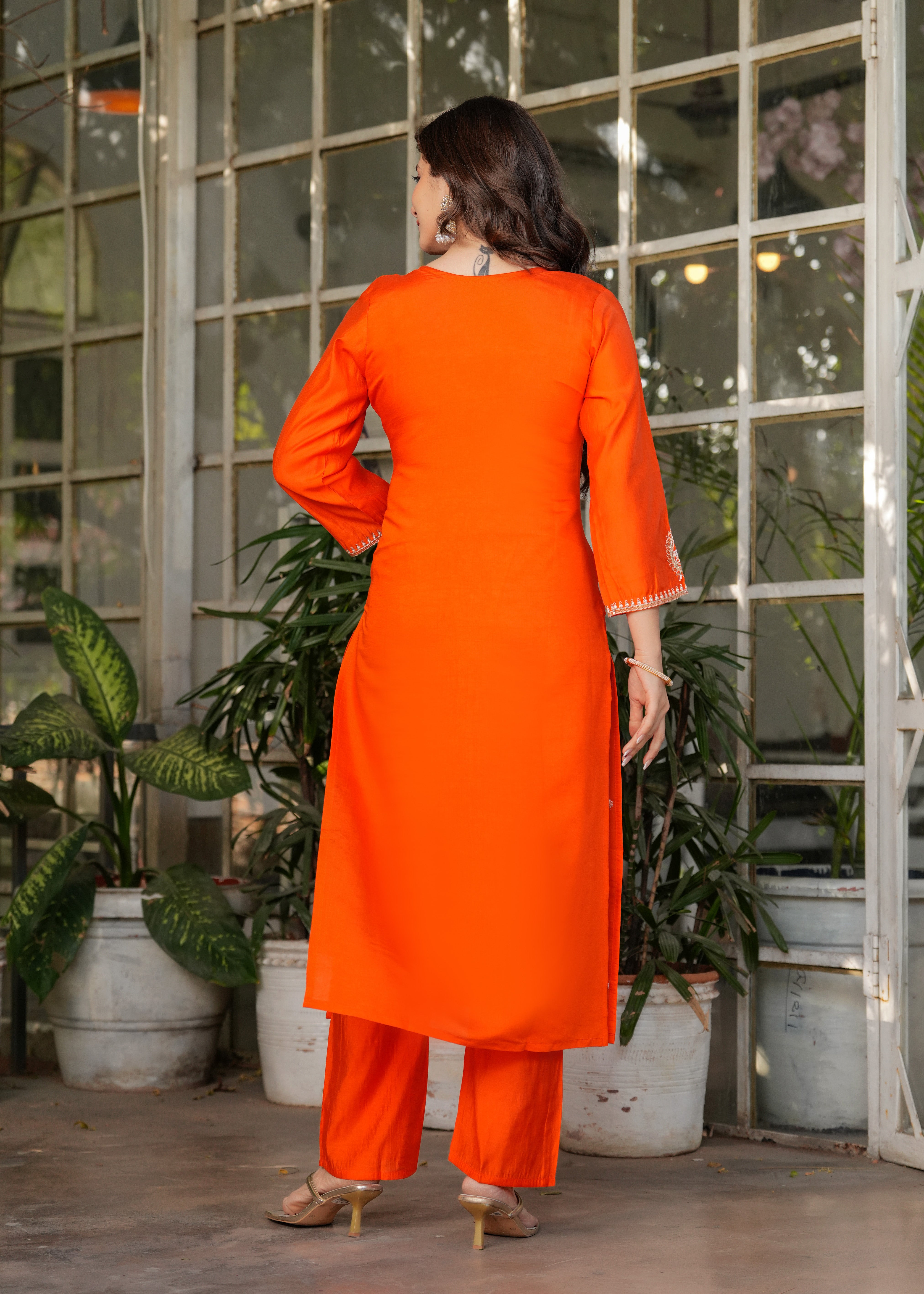 Back view of TRENDBUY woman in orange Viscose Chanderi embroidered kurta set