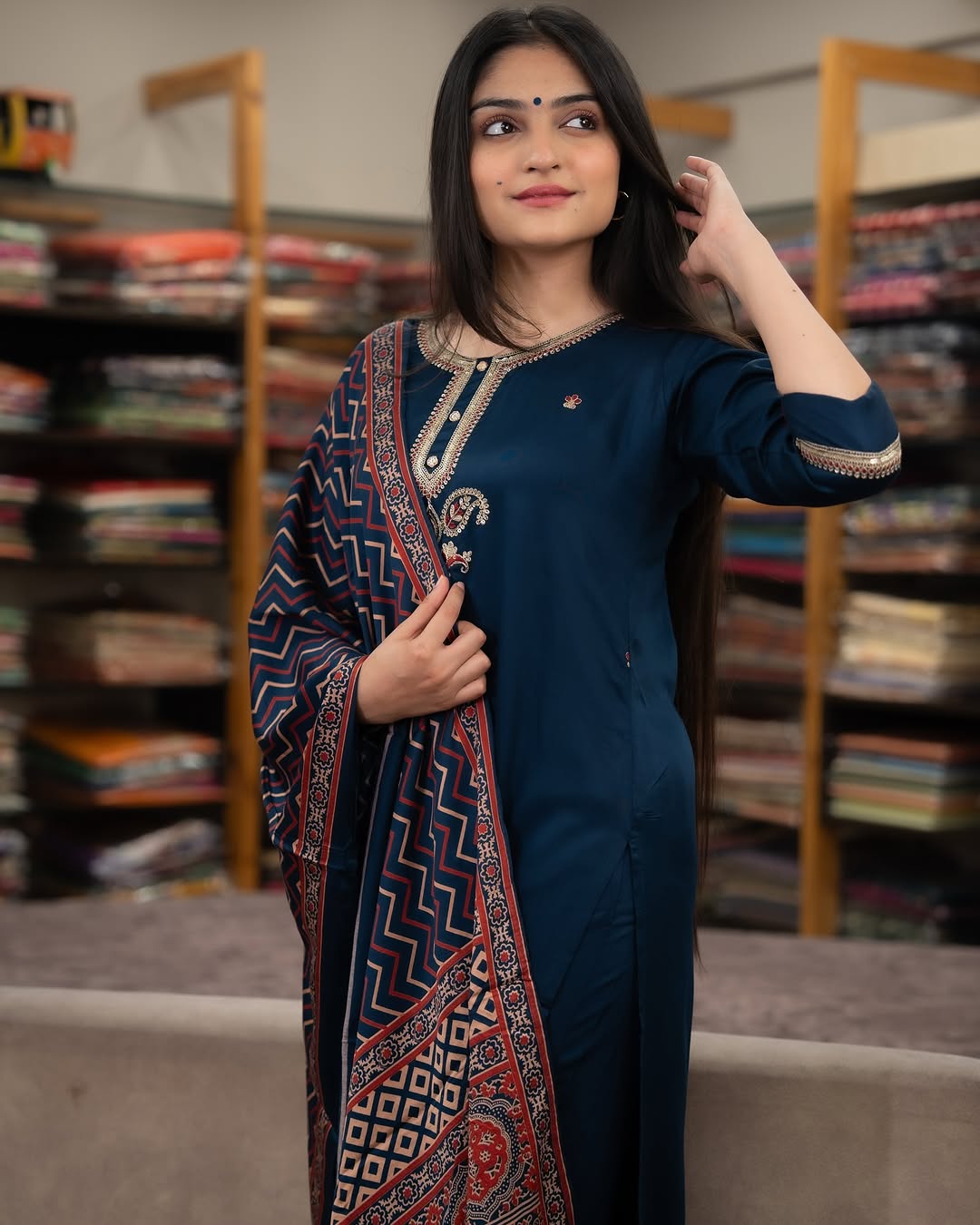 Side profile of woman in deep blue Chanderi Silk Kurta Set, highlighting the fit and details of the ethnic outfit