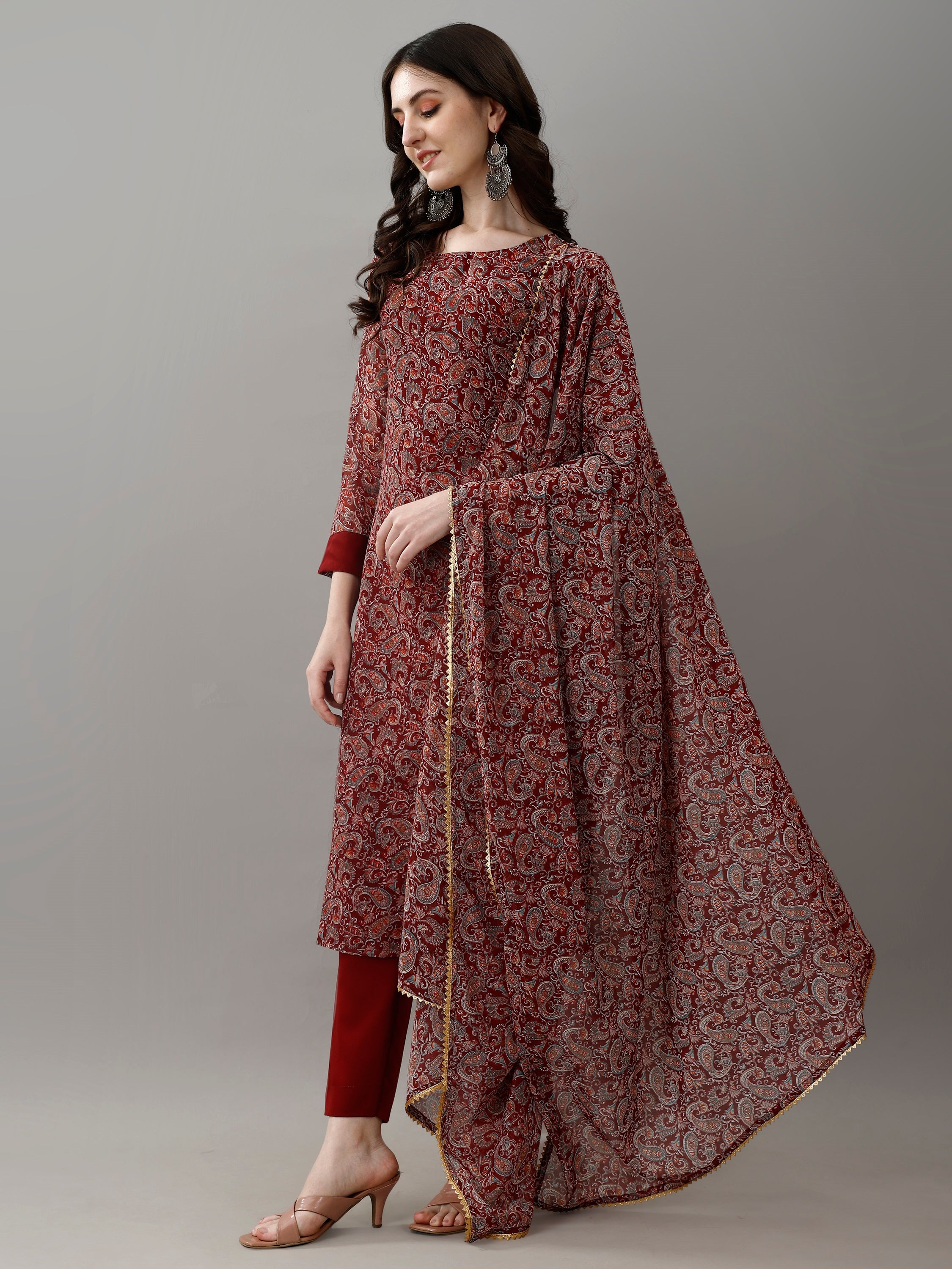 Side view of model wearing TRENDBUY MV-6030 embroidered faux georgette kurti, pants, and dupatta ensemble