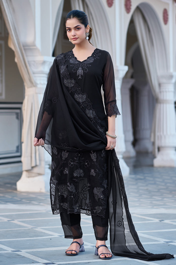 Front view of the black georgette kurti set, with the dupatta elegantly styled over one shoulder, emphasizing the complete traditional ensemble's design.