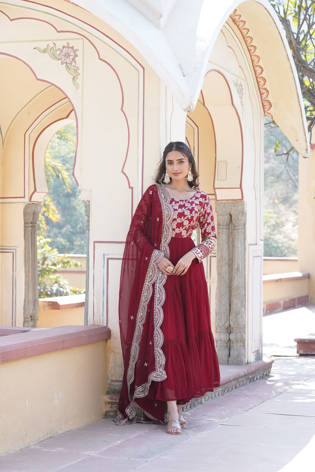 Maroon faux blooming sequin gown with duppatta worn by a model