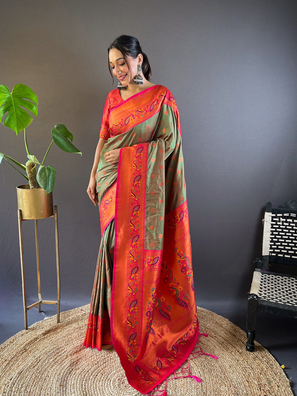 Mehndi Green Silk Paithani Kanjivaram Saree with intricate traditional designs and rich border.