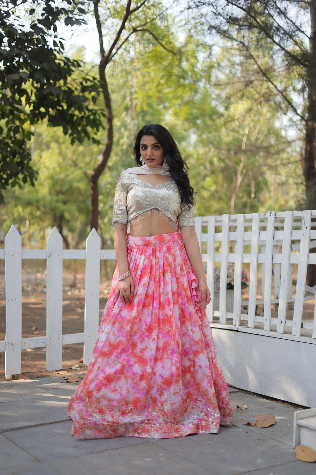 Multi-color digital printed georgette lehenga choli set with vibrant patterns, draped elegantly on a model.