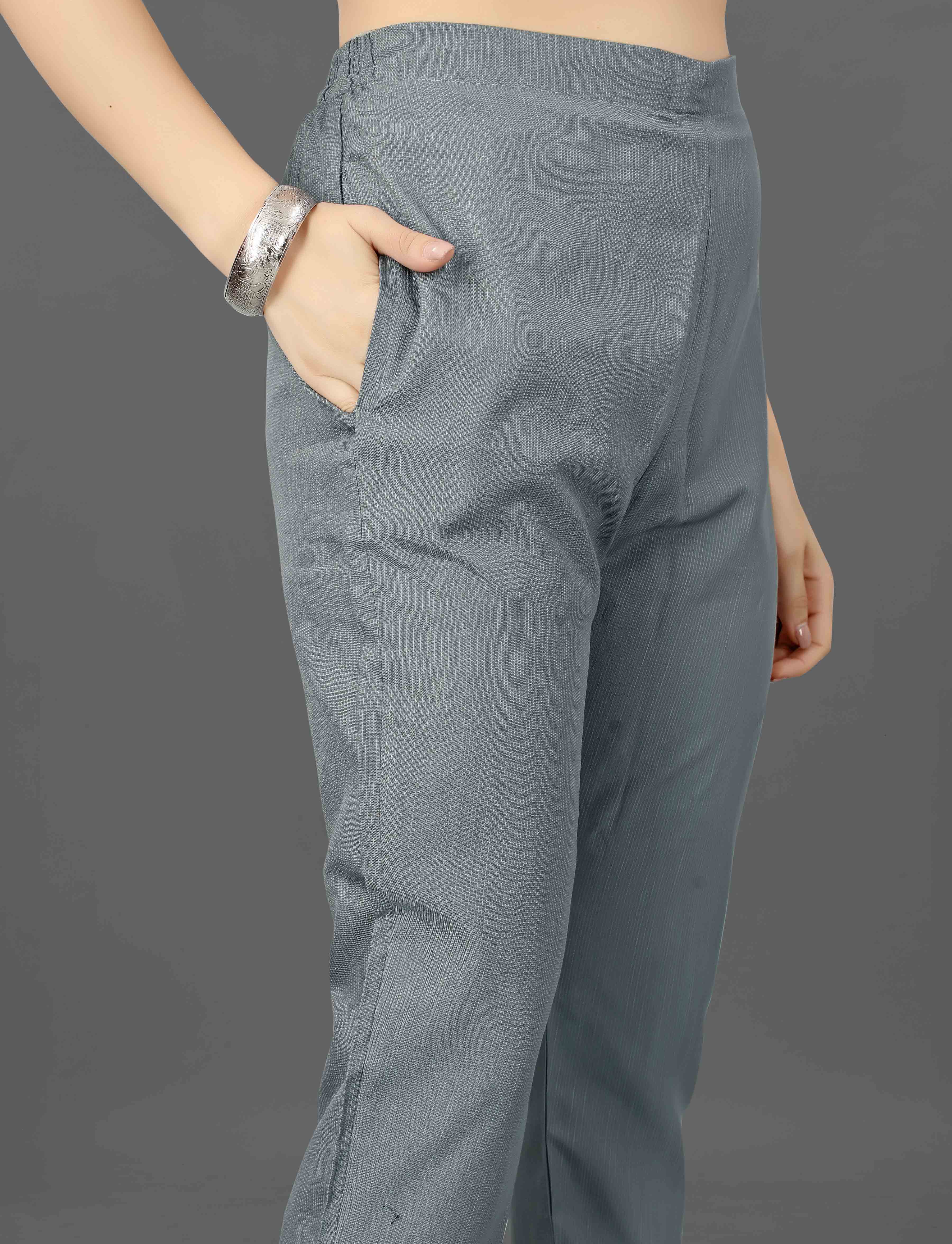Close-up of the comfortable grey cotton blend pant with practical side pockets from the TRENDBUY Mohini kurti set.