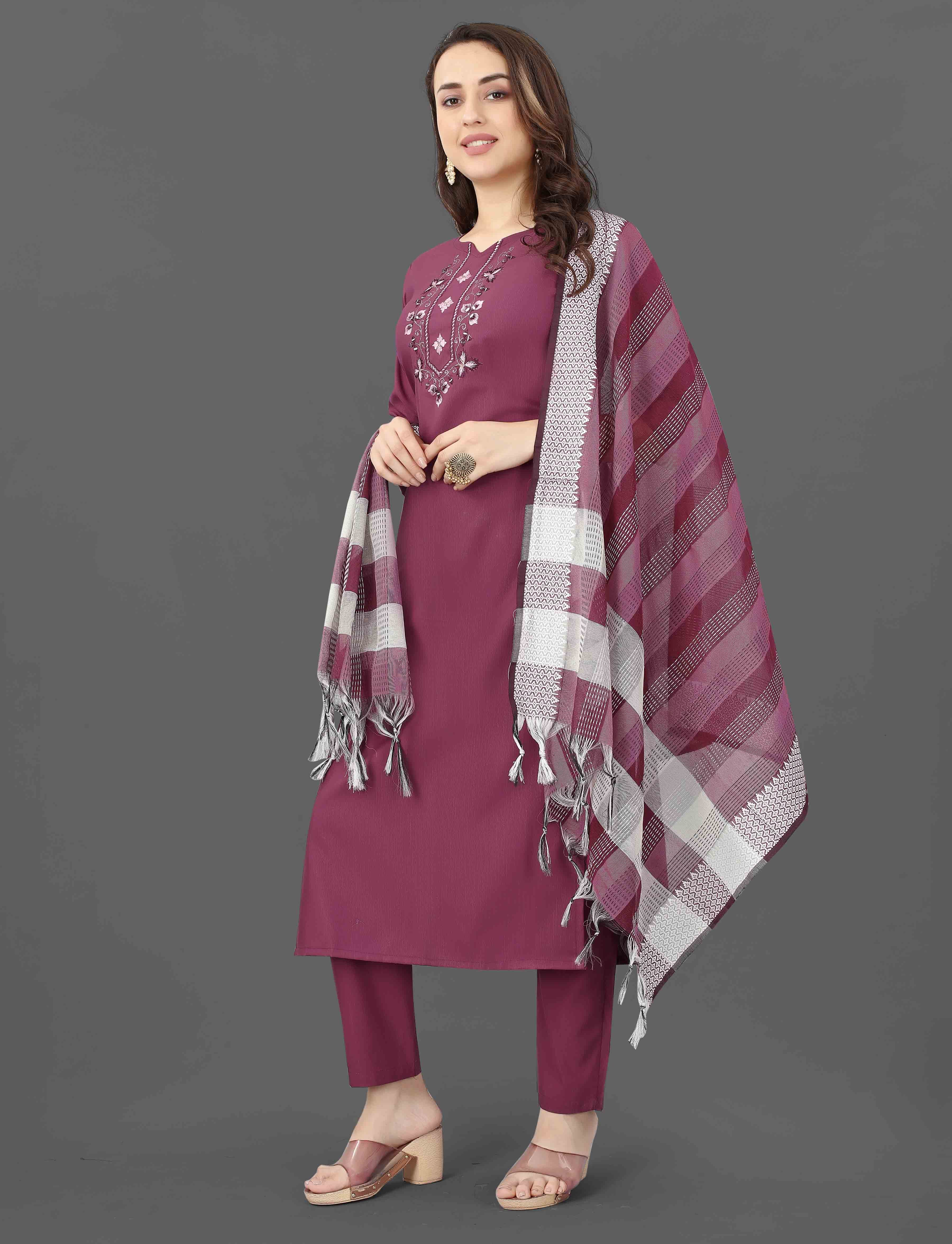 Side view of the TRENDBUY Mohini maroon kurti set, highlighting the graceful silhouette and flowing dupatta.