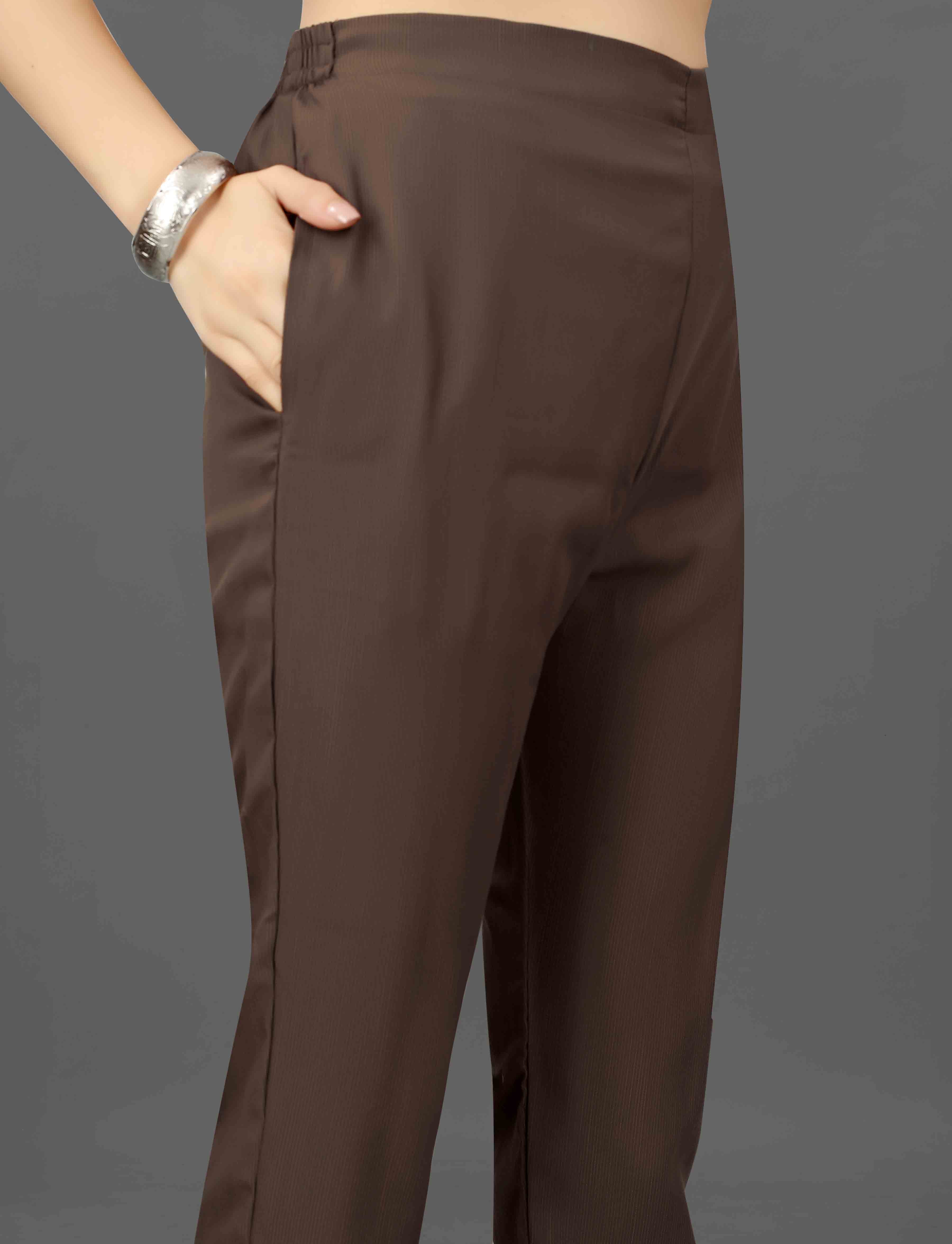 Close-up of the comfortable brown cotton blend pant with practical side pockets from the TRENDBUY Mohini kurti set.