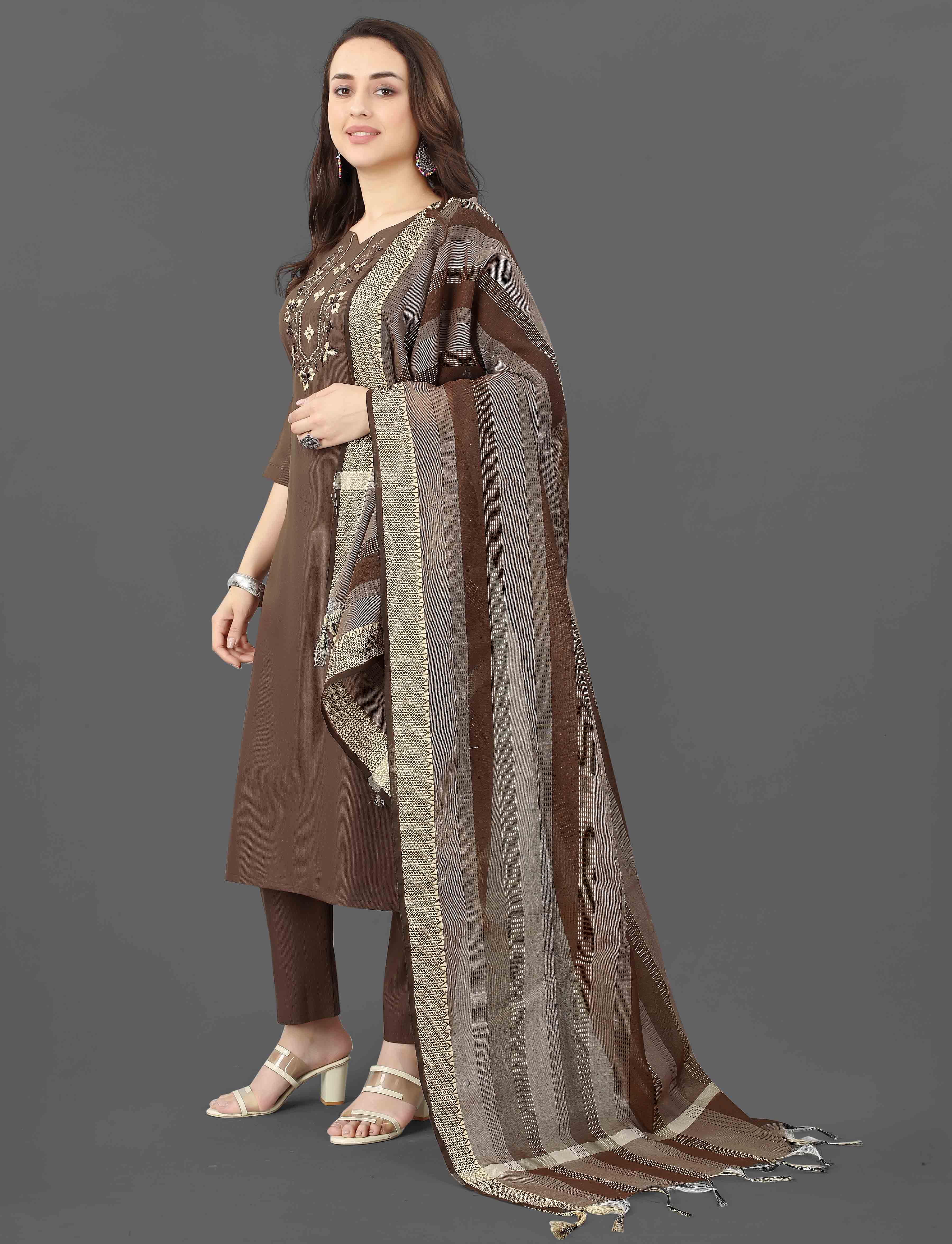 Side view of the TRENDBUY Mohini brown kurti set, highlighting the graceful silhouette and flowing dupatta.