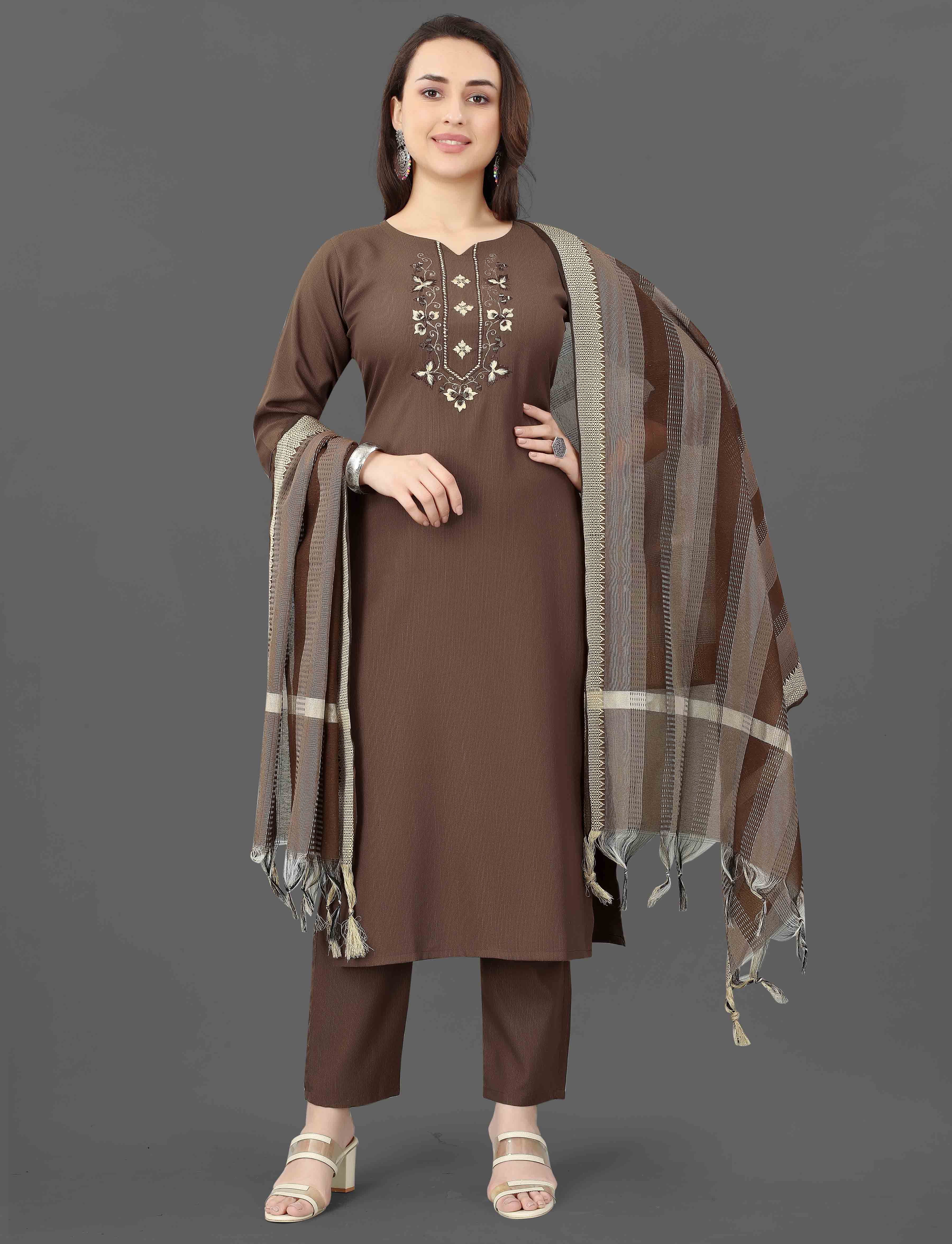 Detailed shot of the V-neckline of the brown kurti, revealing the delicate embroidery and shimmering mirror work.