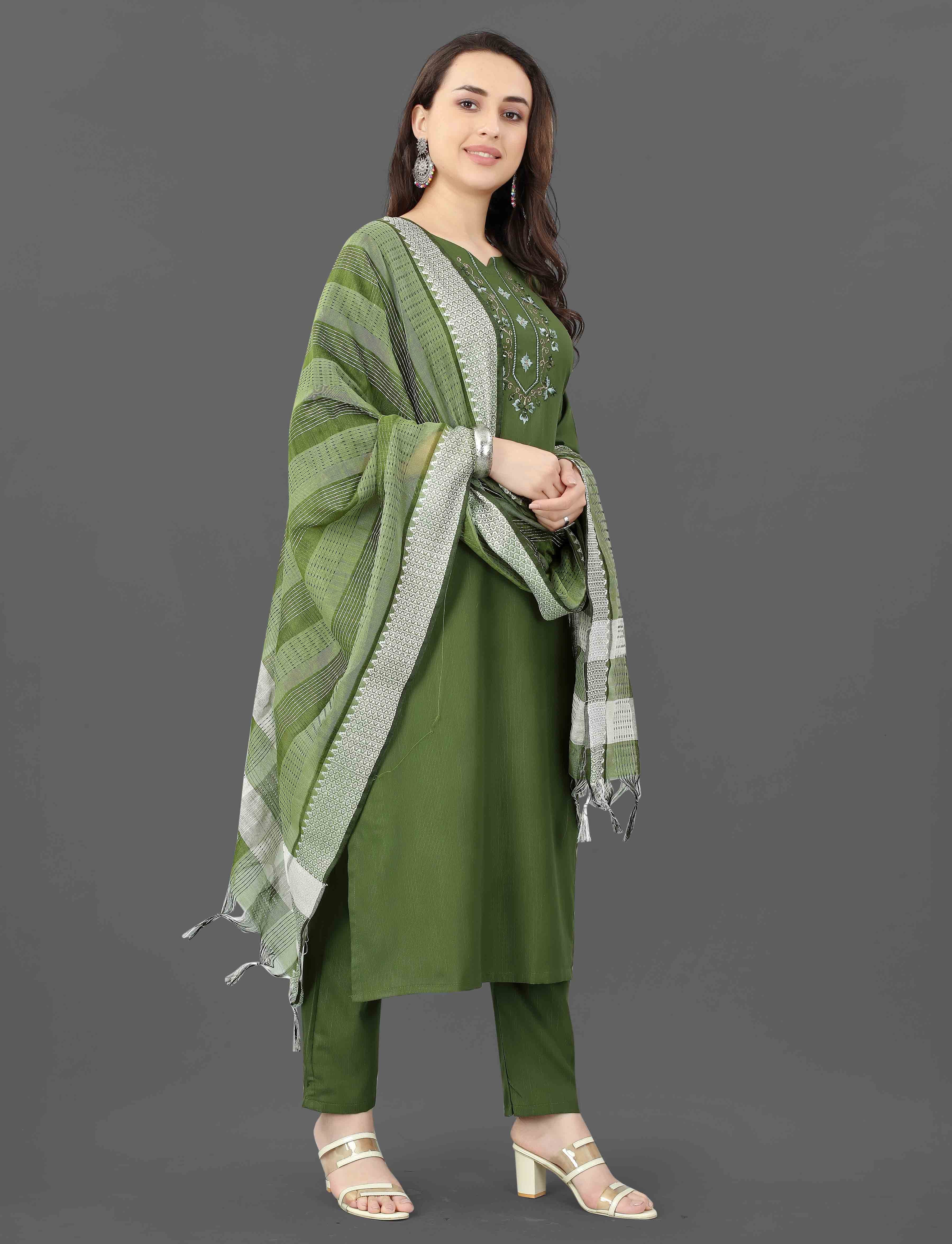 Side view of the TRENDBUY Mohini green kurti set, highlighting the graceful silhouette and flowing dupatta.