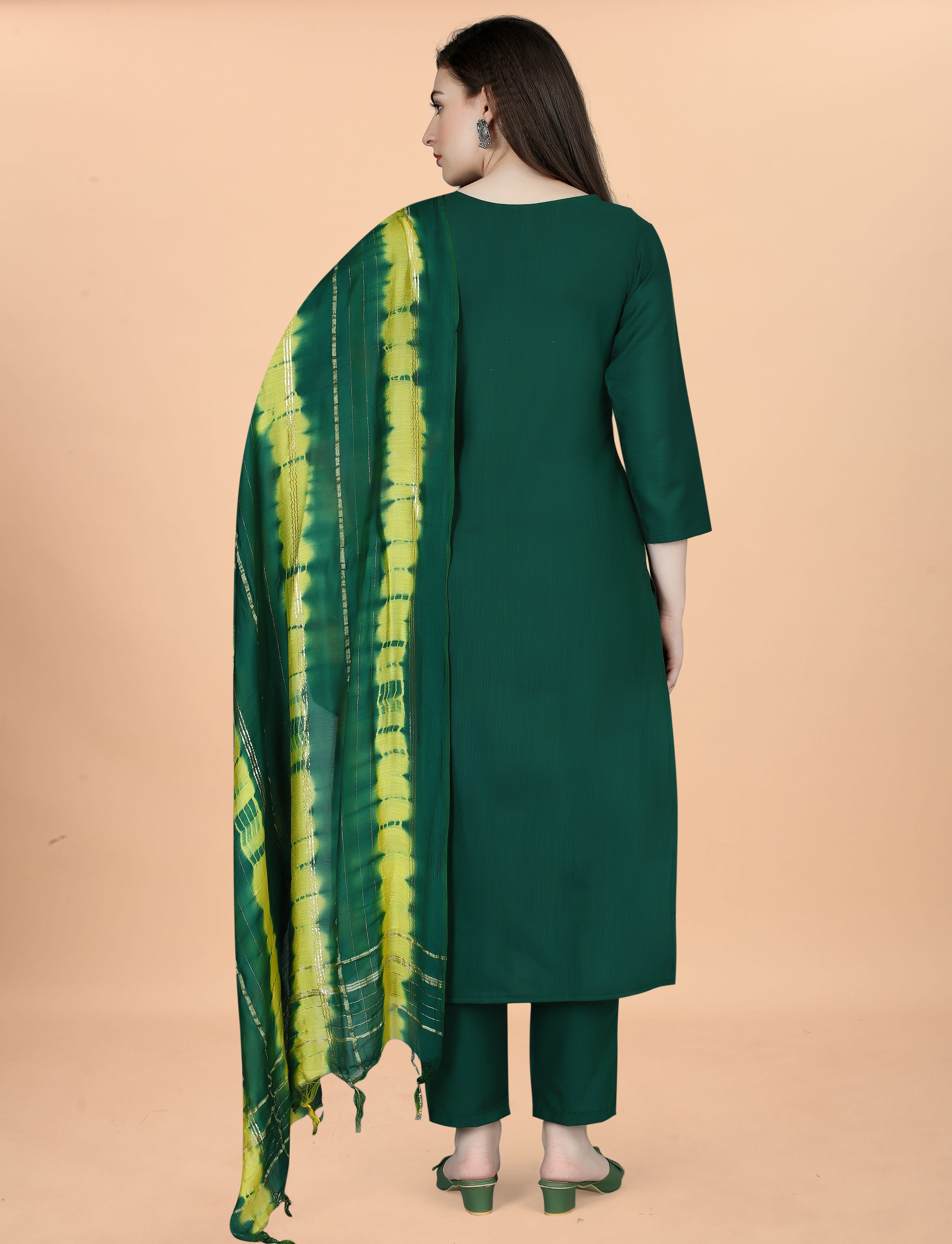 Back view of a woman wearing a deep green cotton blend kurta set, highlighting the tie-dye Chanderi dupatta.