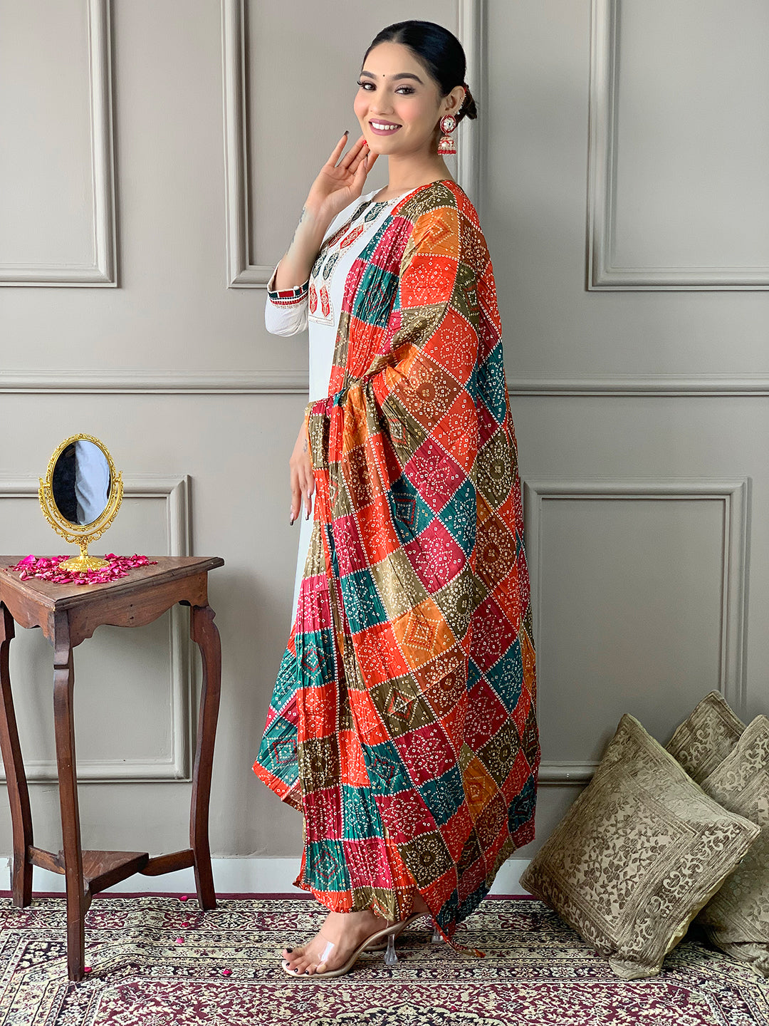 Side profile of a model showcasing the flow and elegance of the TRENDBUY D488 Off-White Kurta Set and silk blend dupatta.