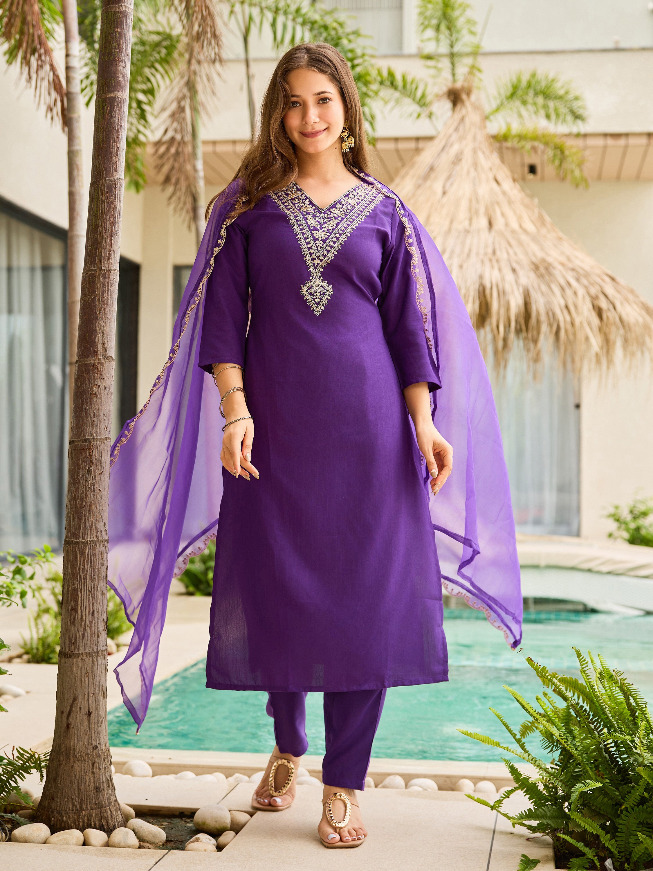TRENDBUY model showcases the elegant drape of the violet embroidered kurti and organza dupatta