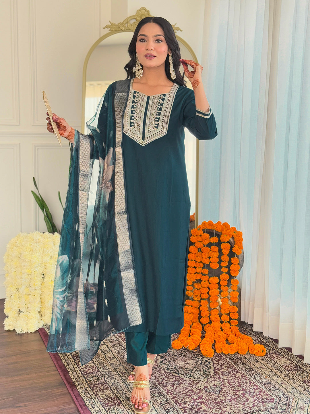 Full-length shot of the woman posing confidently in the teal kurti set, displaying the entire ensemble's elegant silhouette.