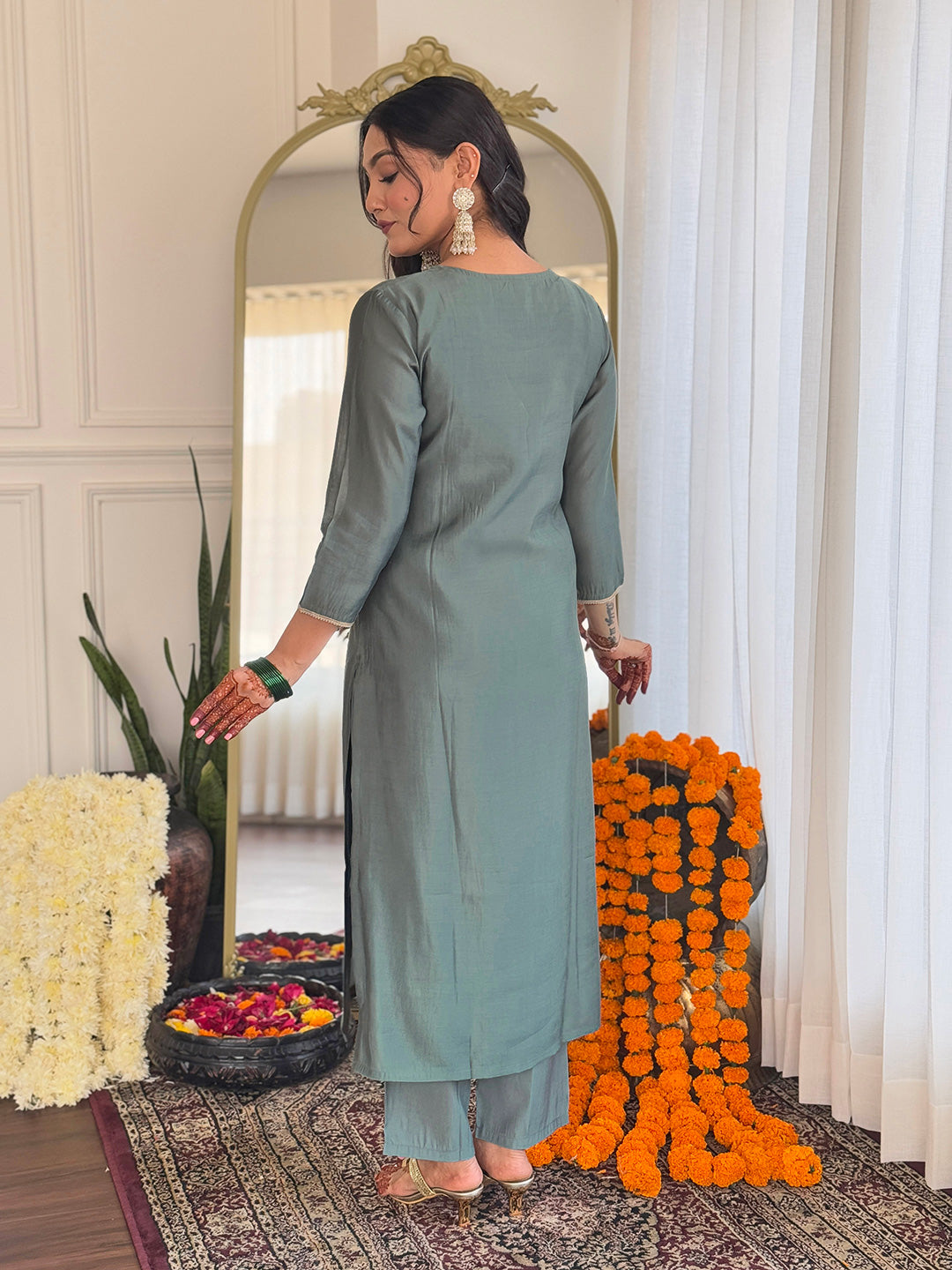 Rear view of the Pista green BSY Viscose kurti and matching pant set, highlighting the simple yet sophisticated design and straight cut.