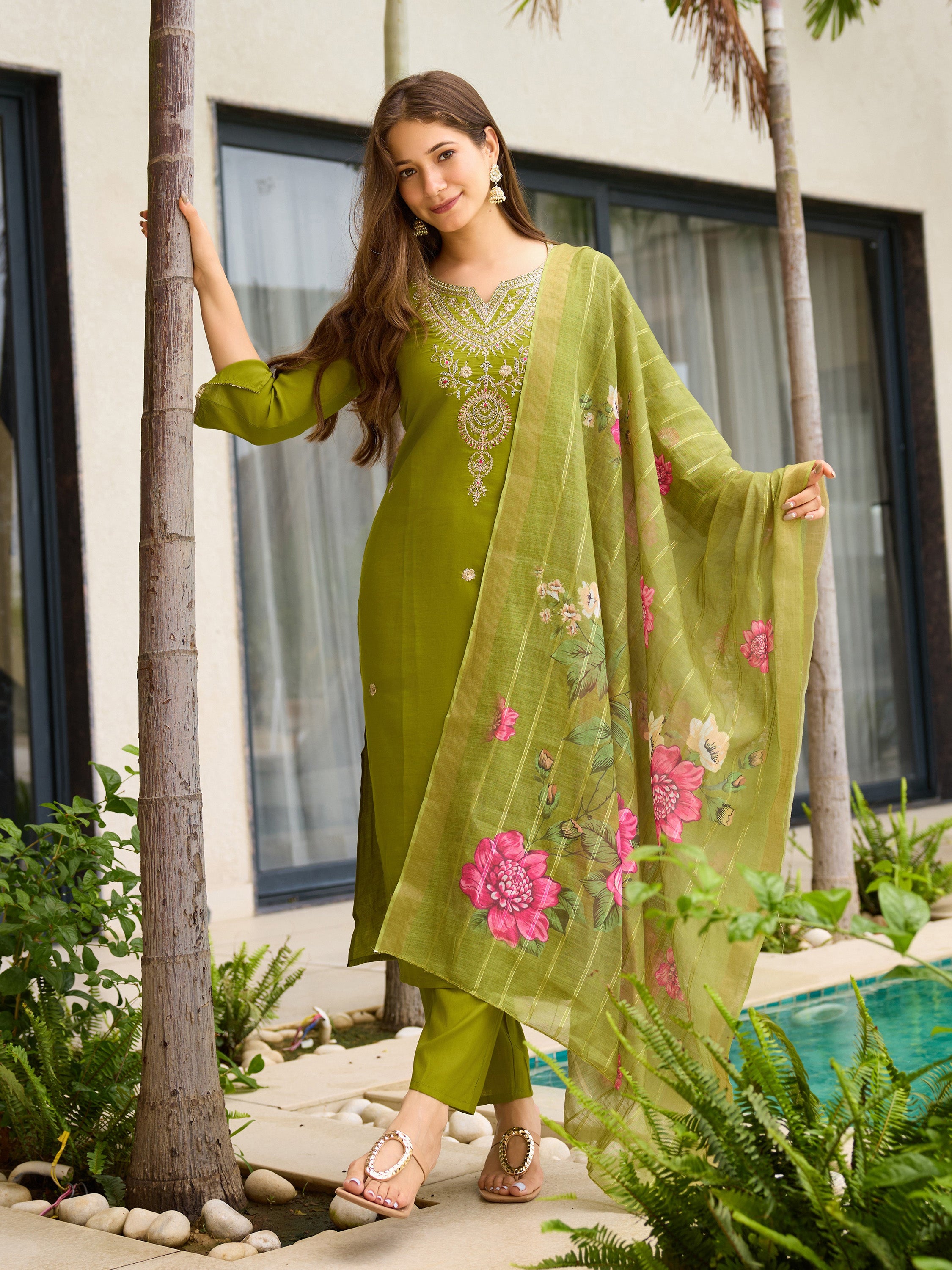 Graceful pose by TRENDBUY model in lime green kurti set, with flowing floral jacquard dupatta, in a garden setting