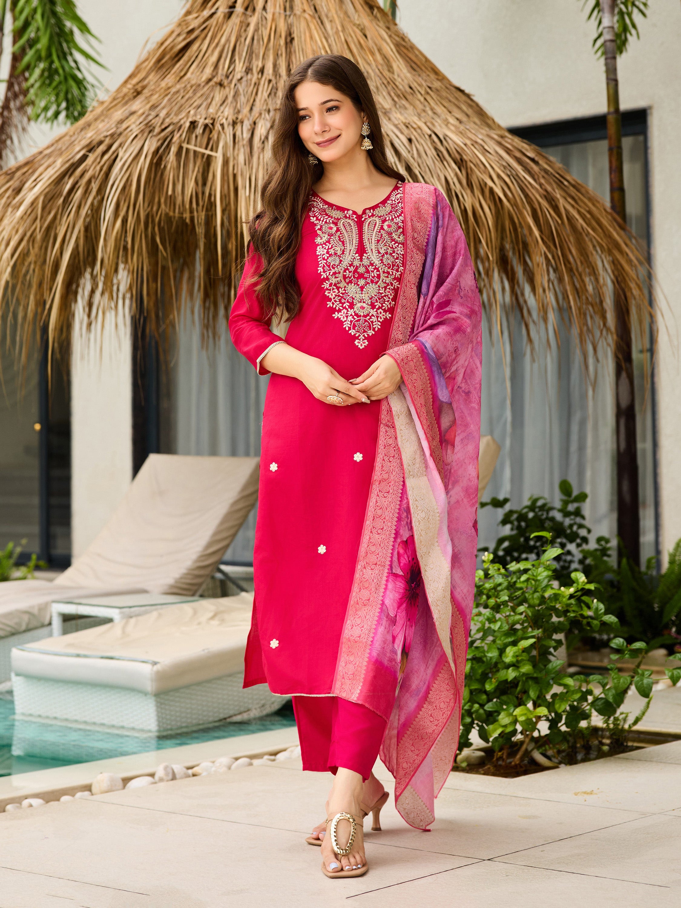 TRENDBUY model in elegant pink embroidered viscose kurti set with floral jacquard dupatta by the pool.
