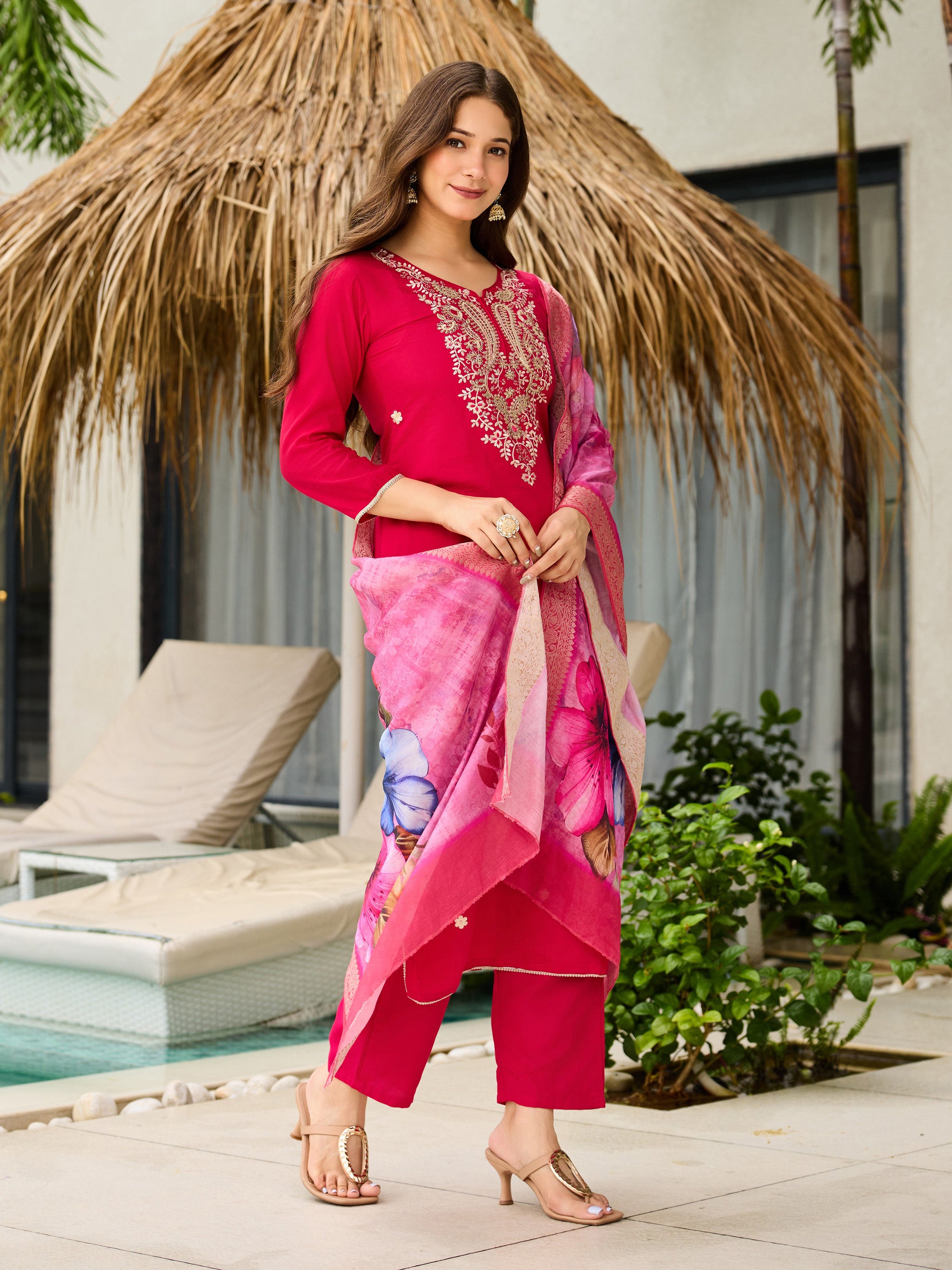 TRENDBUY model showcasing the draped floral jacquard dupatta with the pink embroidered kurti and pant set.