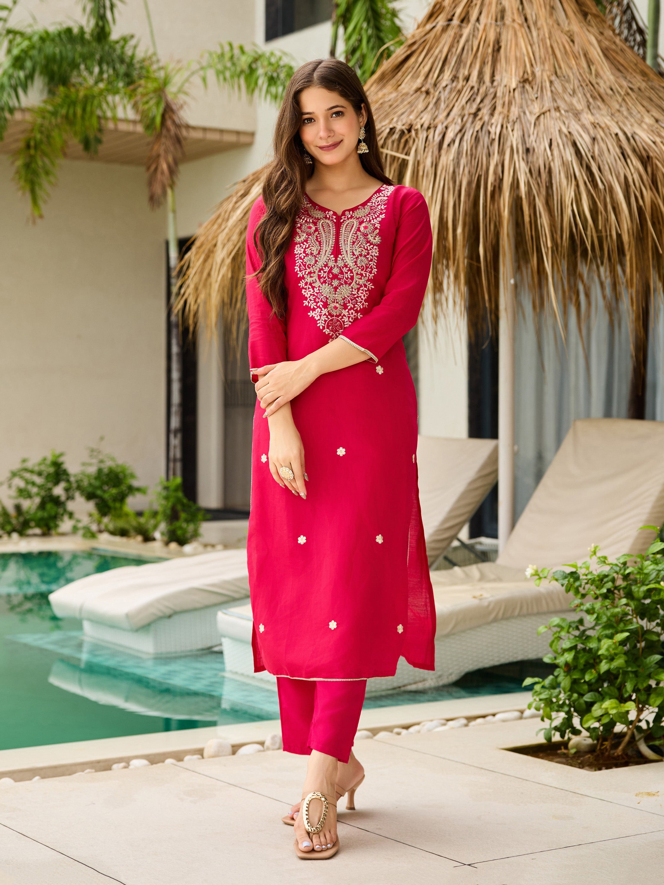 Full length shot of TRENDBUY model in the sophisticated pink embroidered kurti, pant, and dupatta ensemble.
