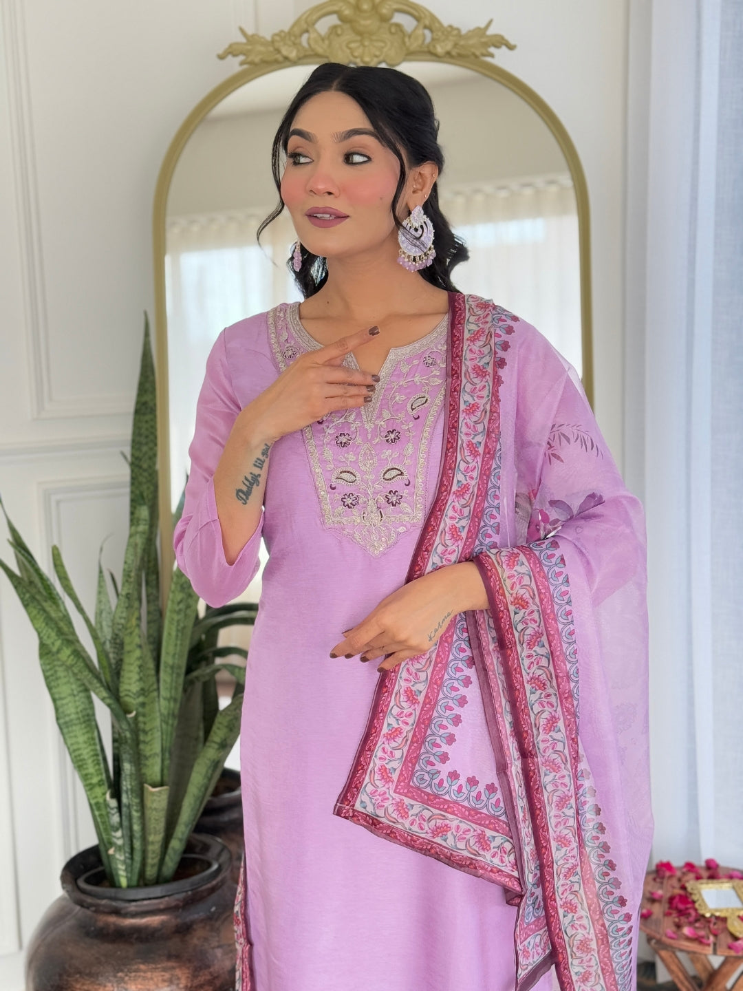 Model elegantly posing, highlighting the lavender rayon kurti with intricate embroidery and the patterned dupatta.
