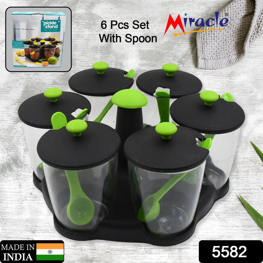 6-piece multipurpose revolving plastic spice container rack with 6 spoons for masala, aachar & condiments.